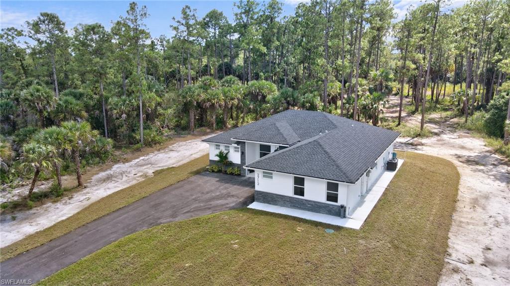 2712 40th Avenue Southeast Naples, FL 34117 - Photo 34 of 41 an aerial view of a house