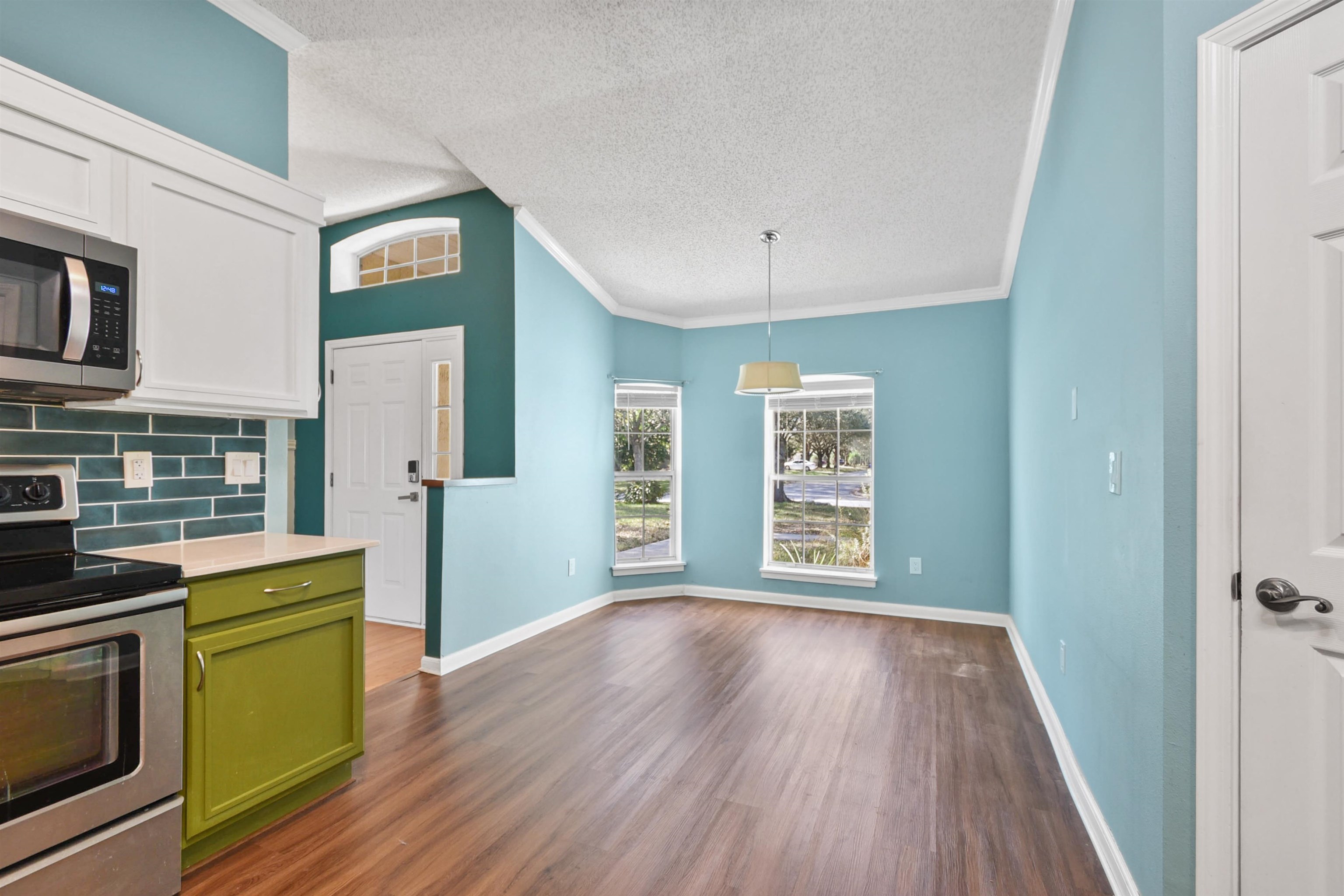 420 Bay Point Way North St. Johns, FL 32259 - Photo 14 of 37 a view of an empty room with window and wooden floor