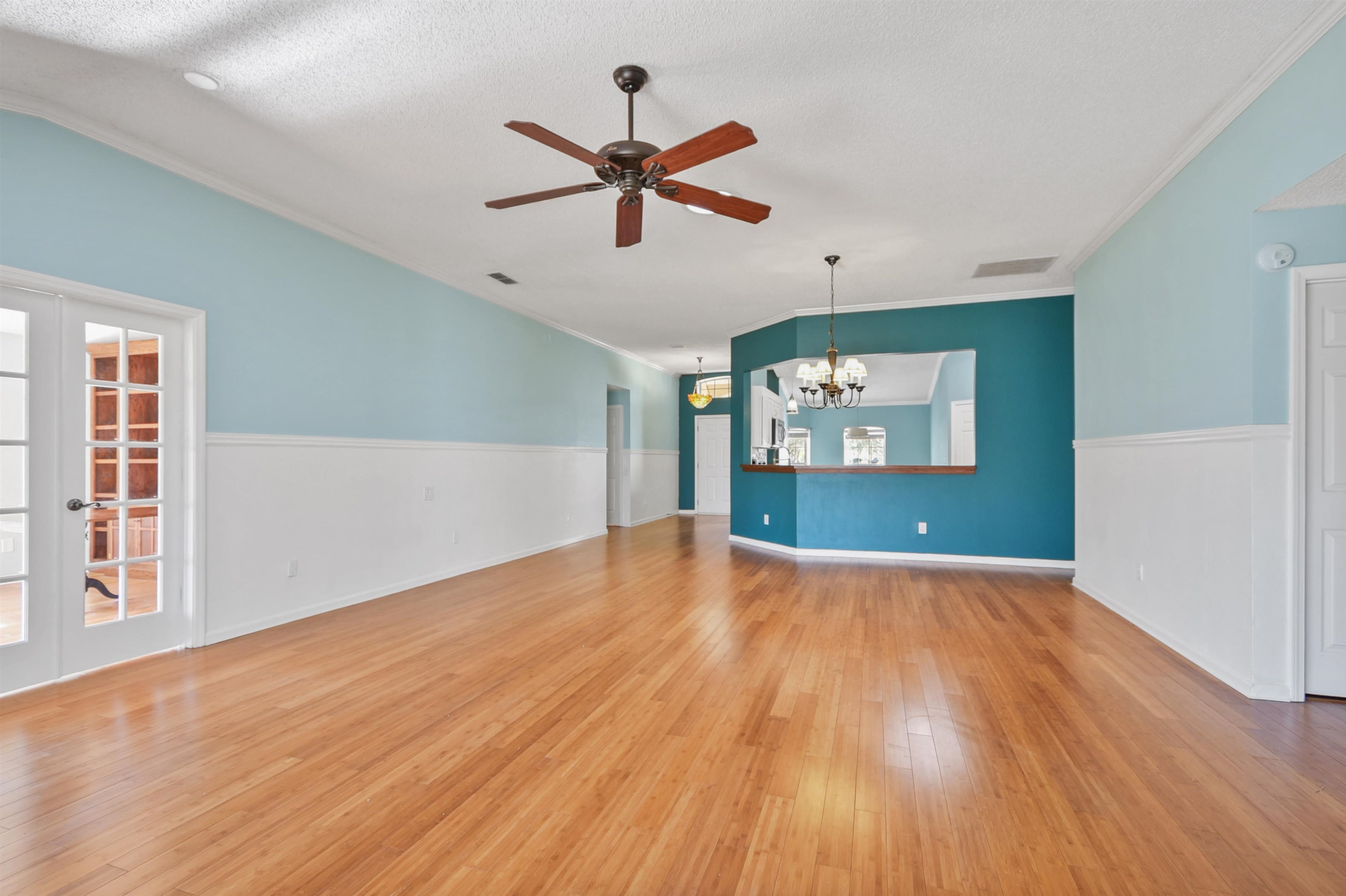 420 Bay Point Way North St. Johns, FL 32259 - Photo 15 of 37 a view of empty room with wooden floor and fan