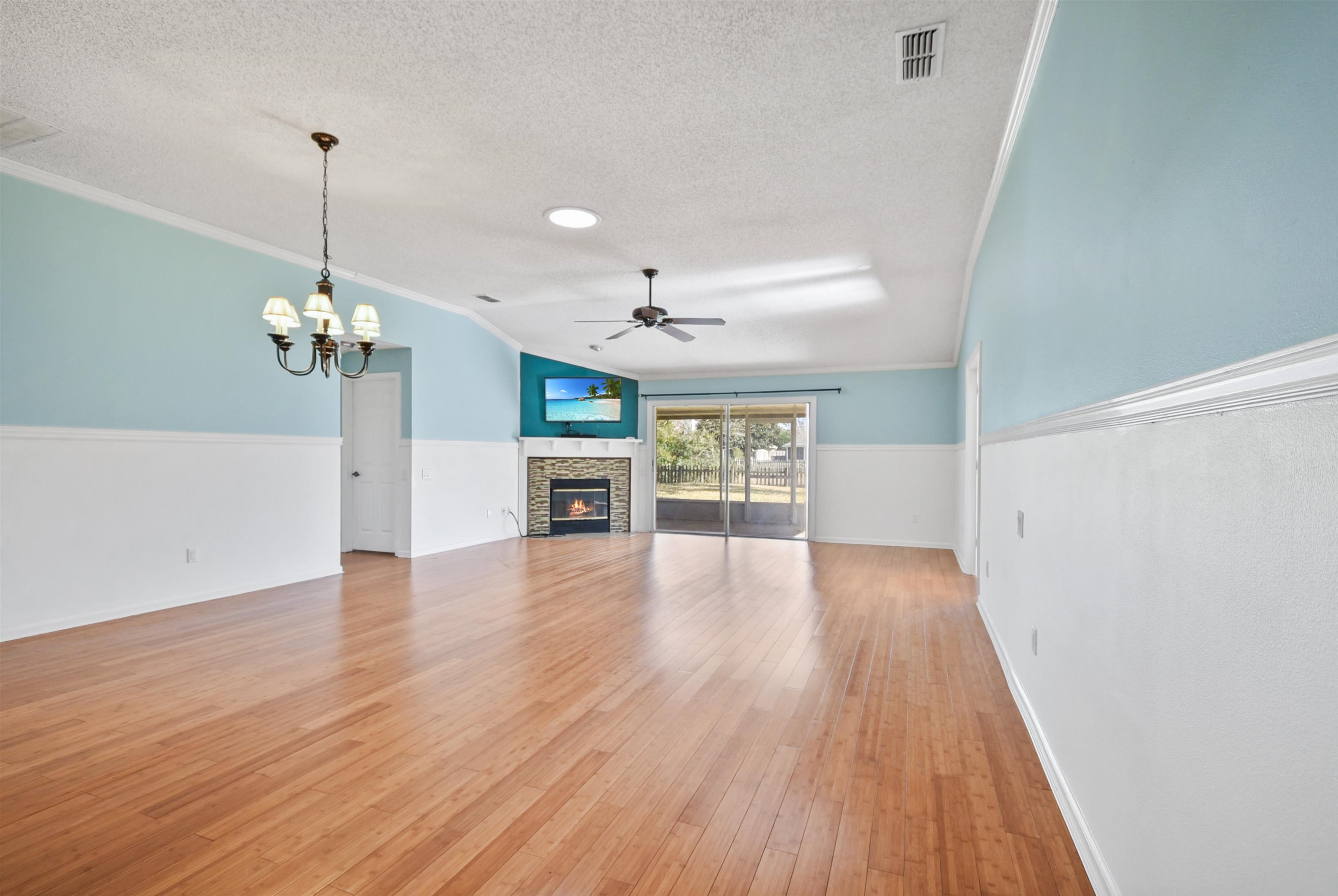 420 Bay Point Way North St. Johns, FL 32259 - Photo 16 of 37 a view of a room with wooden floor ceiling fan