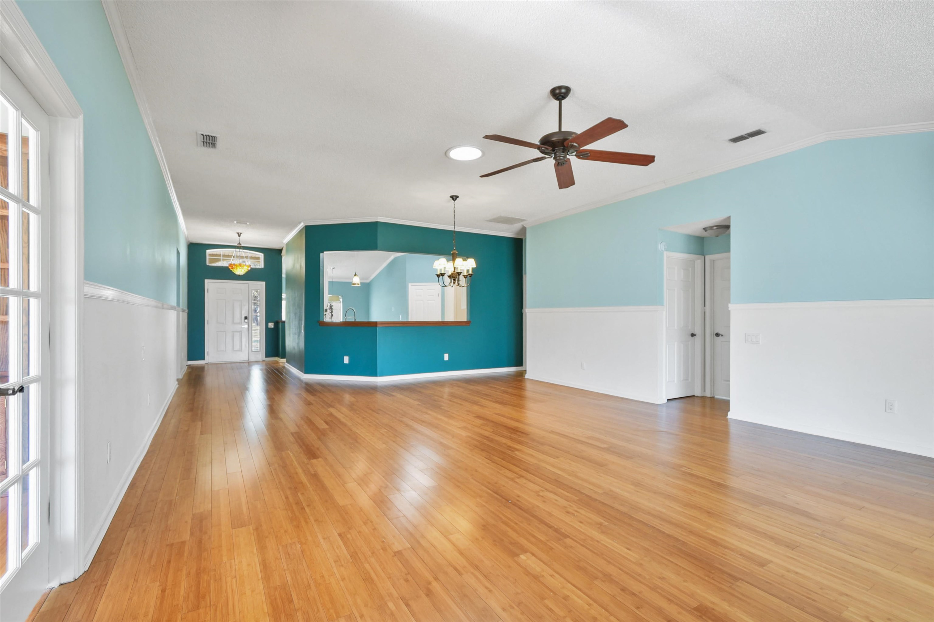 420 Bay Point Way North St. Johns, FL 32259 - Photo 17 of 37 a view of empty room with wooden floor and fan