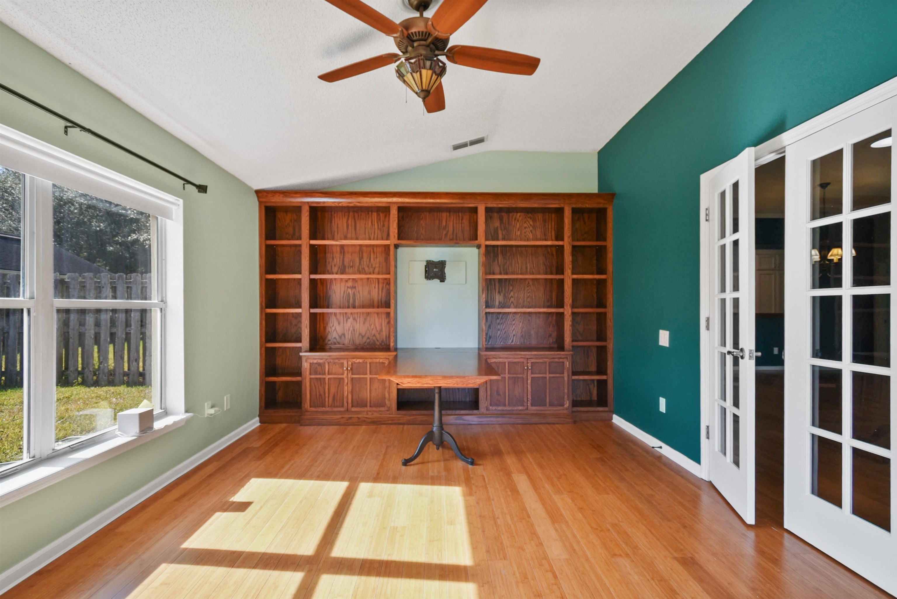 420 Bay Point Way North St. Johns, FL 32259 - Photo 18 of 37 Unfurnished office featuring lofted ceiling, light wood-style floors, ceiling fan, and french doors