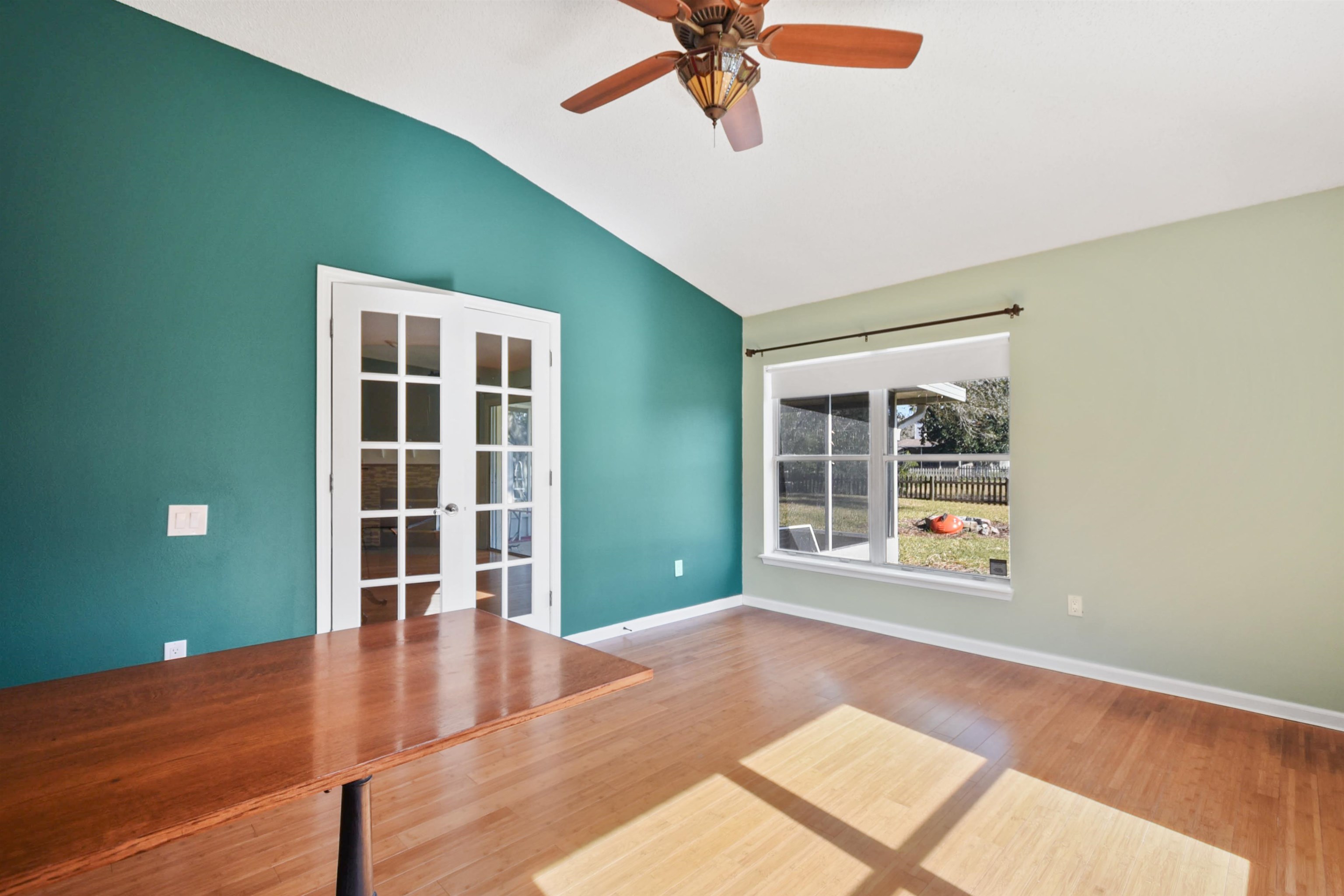 420 Bay Point Way North St. Johns, FL 32259 - Photo 19 of 37 a view of an empty room with a window and wooden floor