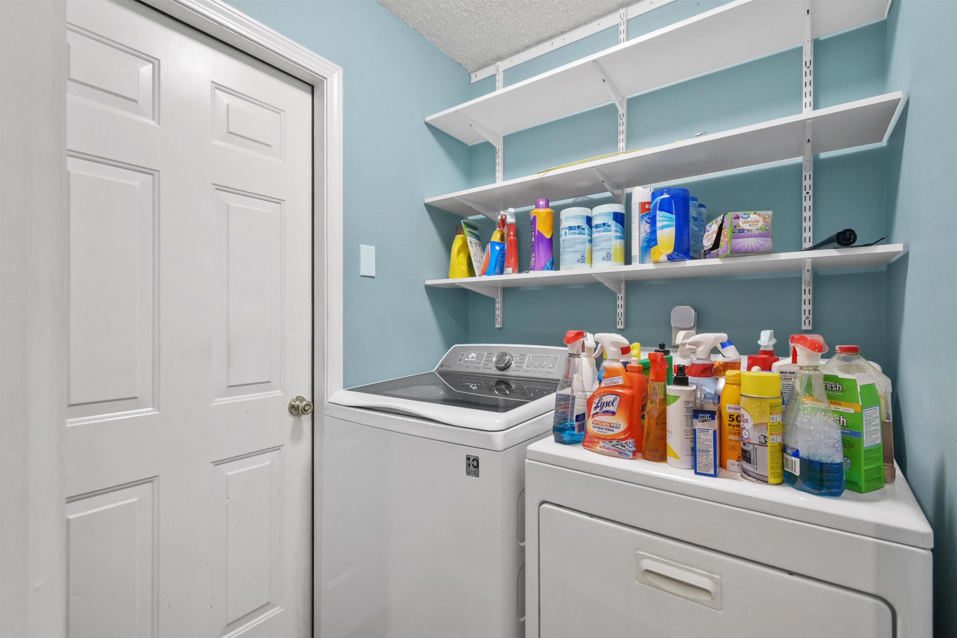 420 Bay Point Way North St. Johns, FL 32259 - Photo 20 of 37 Laundry area with washer and dryer and a textured ceiling