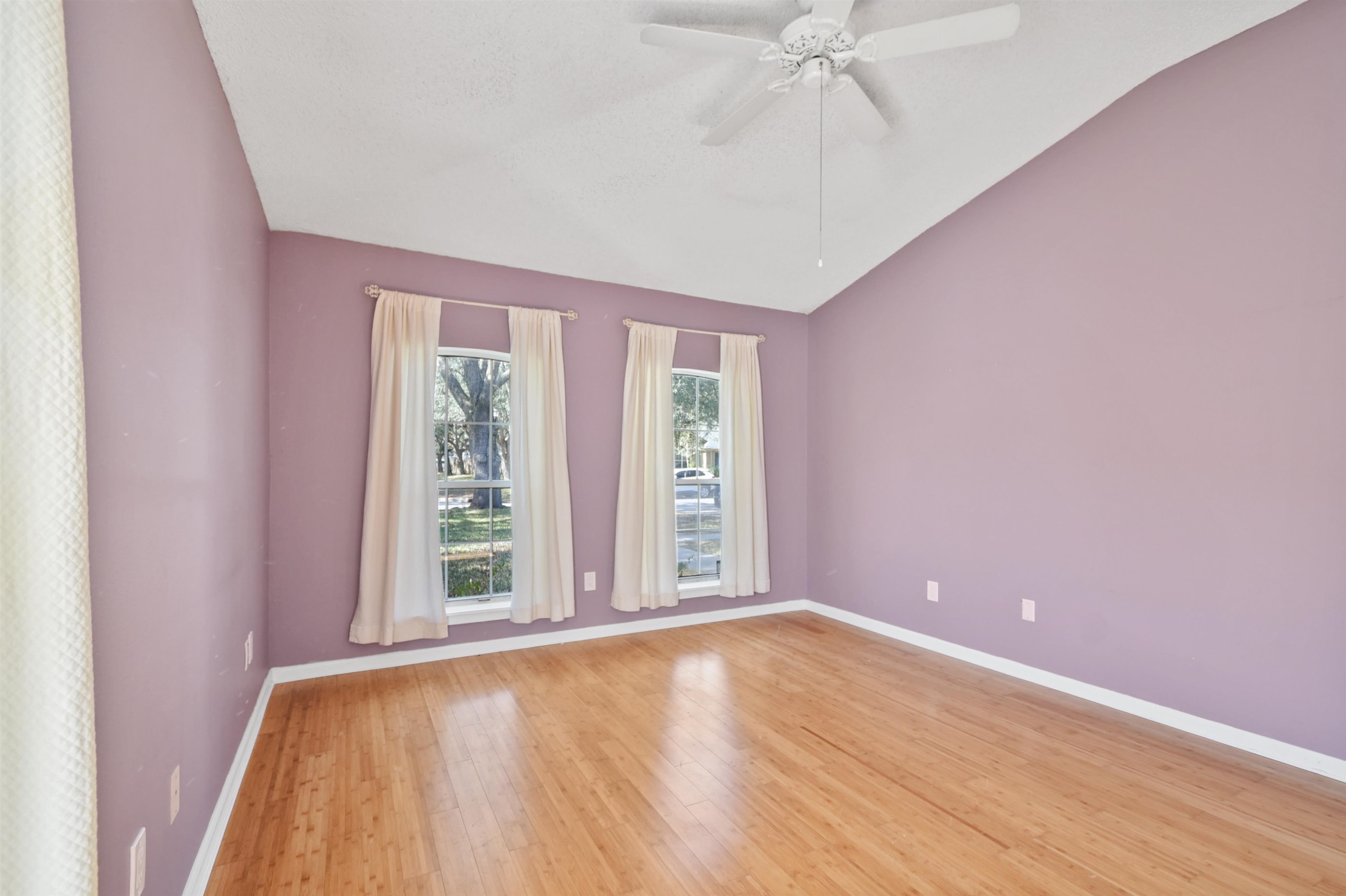 420 Bay Point Way North St. Johns, FL 32259 - Photo 23 of 37 an empty room with wooden floor and windows