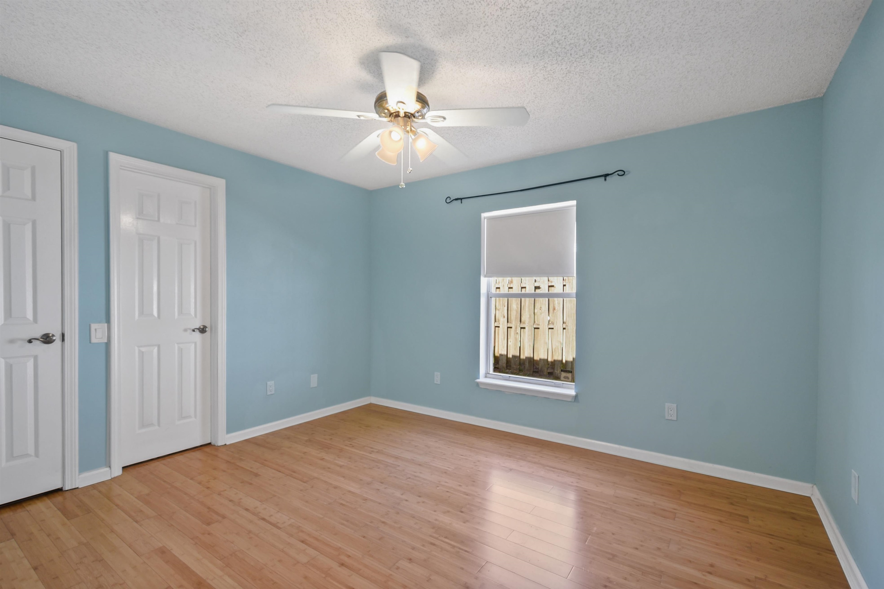 420 Bay Point Way North St. Johns, FL 32259 - Photo 33 of 37 a view of an empty room with a window and wooden floor