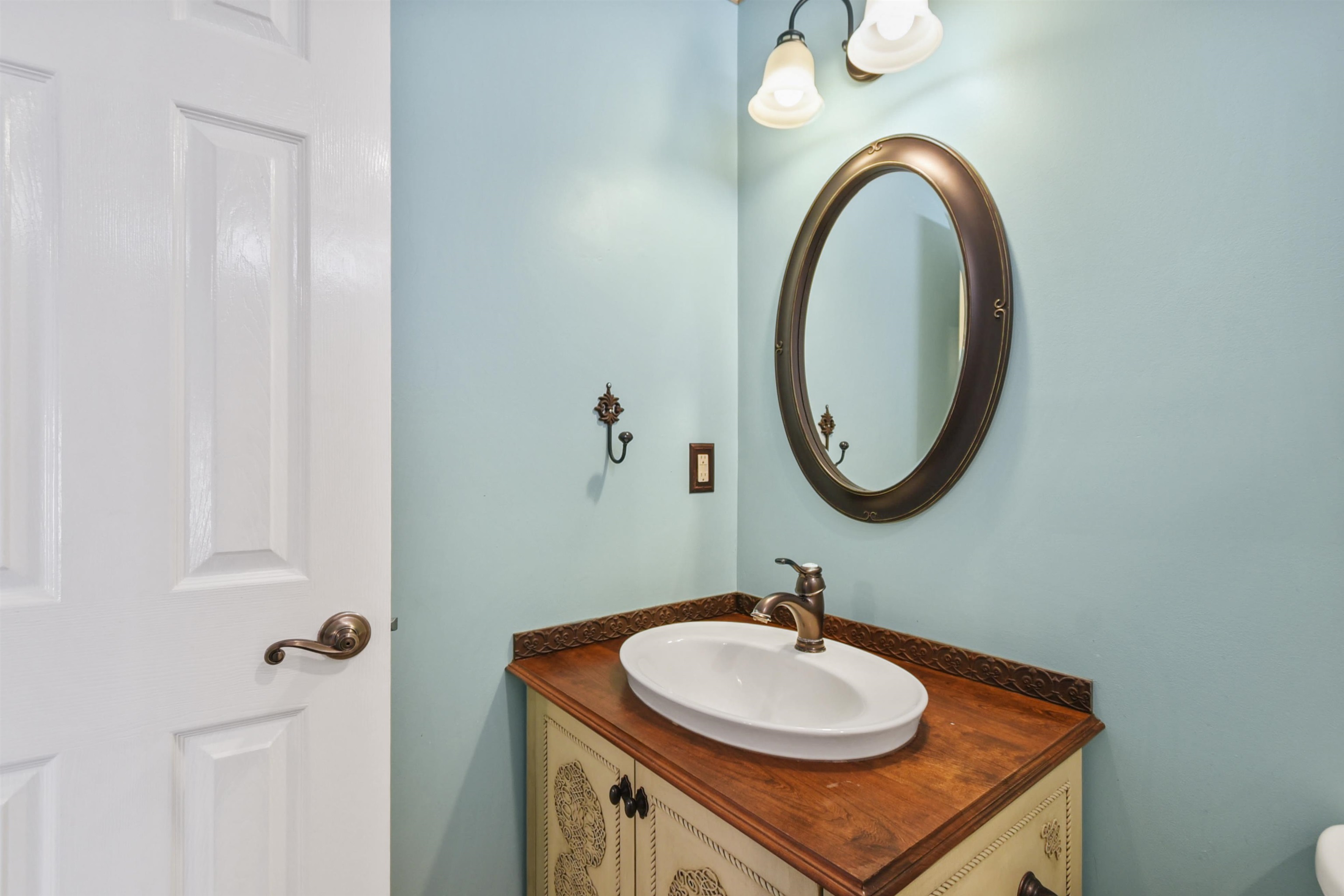 420 Bay Point Way North St. Johns, FL 32259 - Photo 37 of 37 a bathroom with a granite countertop sink and a mirror