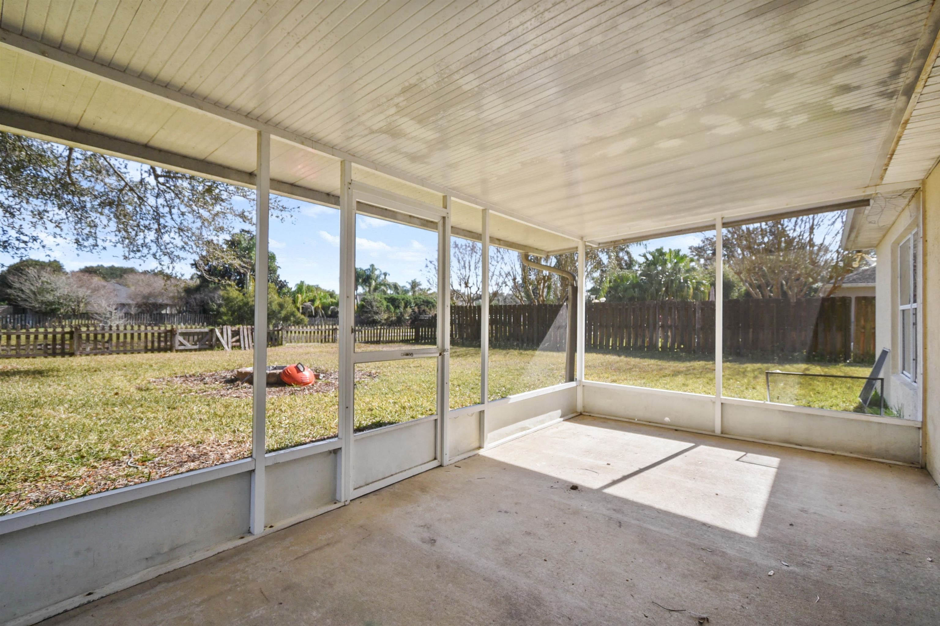 420 Bay Point Way North St. Johns, FL 32259 - Photo 9 of 37 a view of an empty room with a floor to ceiling window