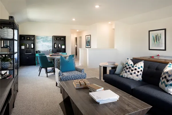 a living room with furniture and a couch