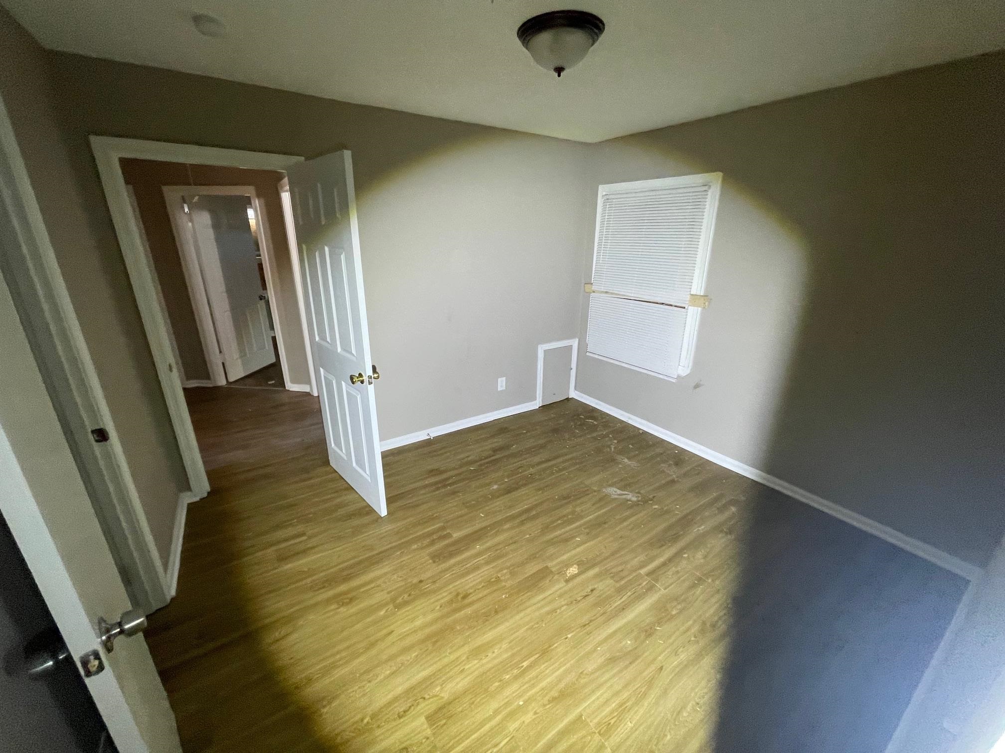 4721 Dalton Road Memphis, TN 38109 - Photo 3 of 3 wooden floor in an empty room