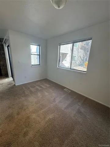 a kitchen with a sink and a window