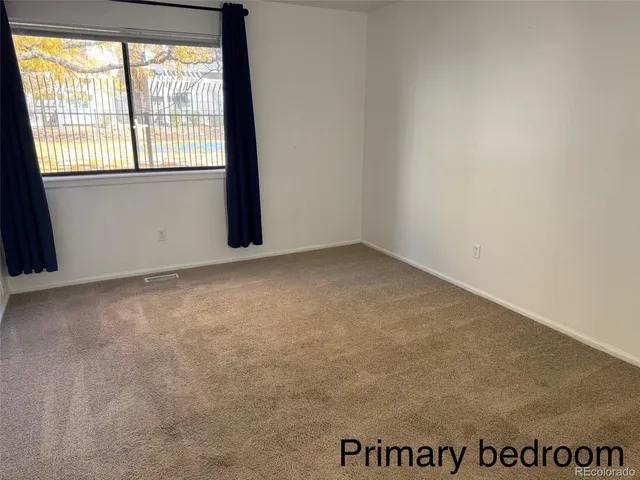 an empty room with a window