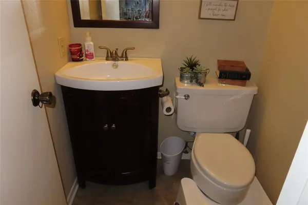 a bathroom with a sink and a toilet
