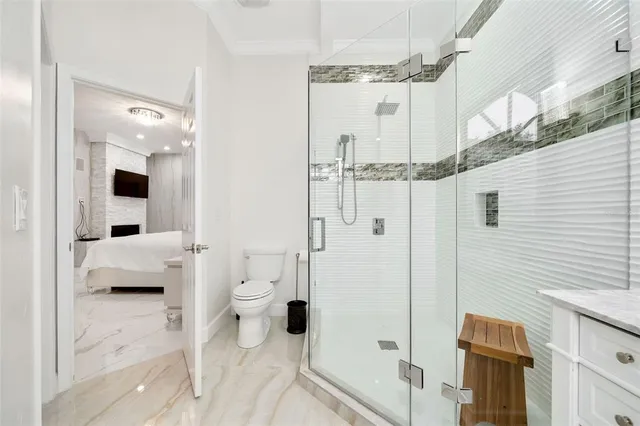 a en suite spacious bathroom with a toilet sink and shower