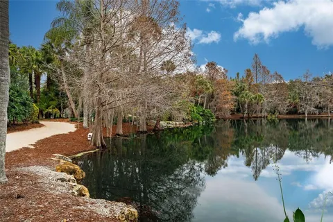 a view of a lake with a building in the background