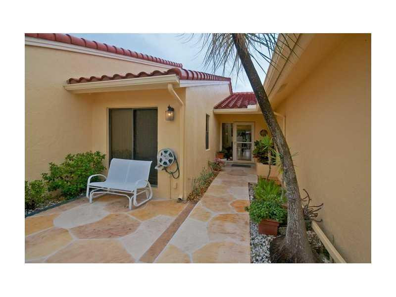 19976 Mona Circle, Unit 19976 Boca Raton, FL 33434 - Photo 2 of 22 Exterior Front