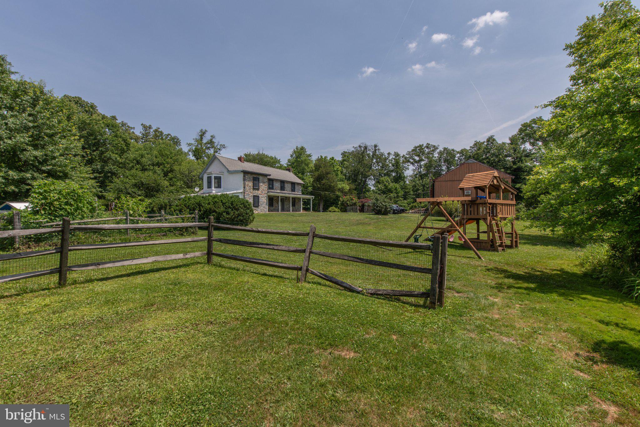 1350 Old Plains Road Pennsburg, PA 18073 - Photo 44 of 72 Spacious yard with playset and charm.