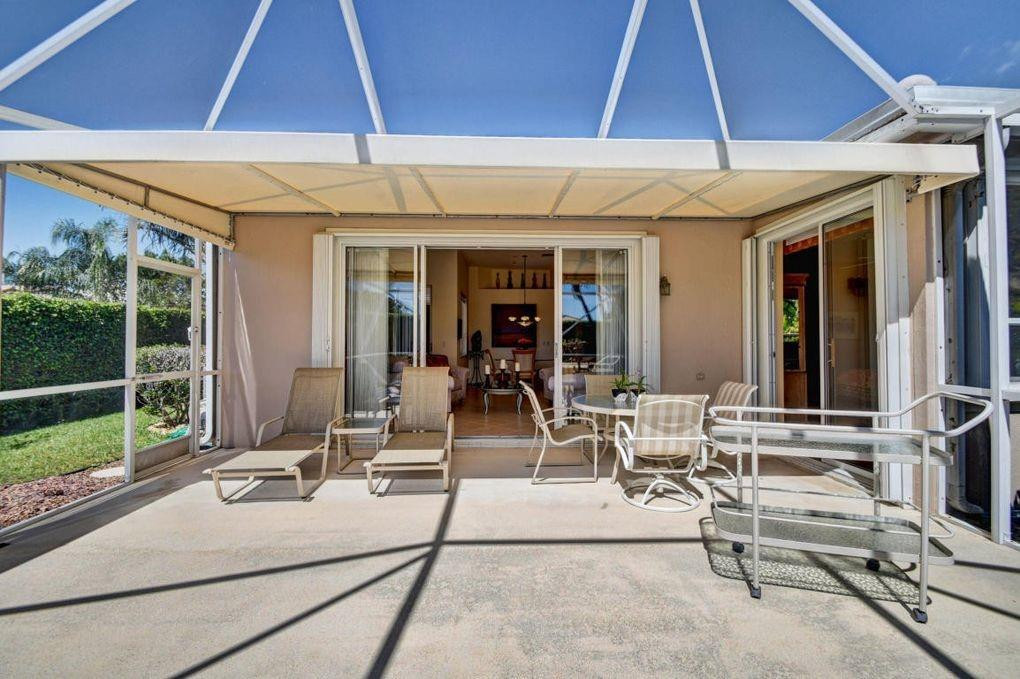 23446 Rakelle Circle Boca Raton, FL 33433 - Photo 24 of 39 Large screen Patio, rear of home