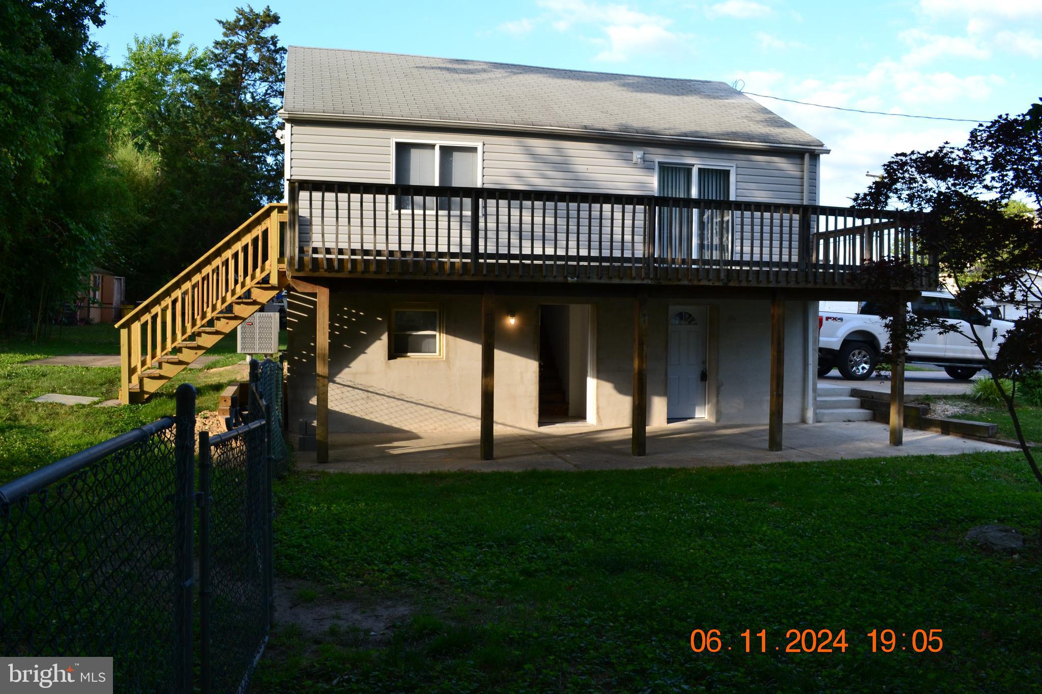 329 A Bar Harbor Road Pasadena, MD 21122 - Photo 17 of 18 a view of a house with a deck