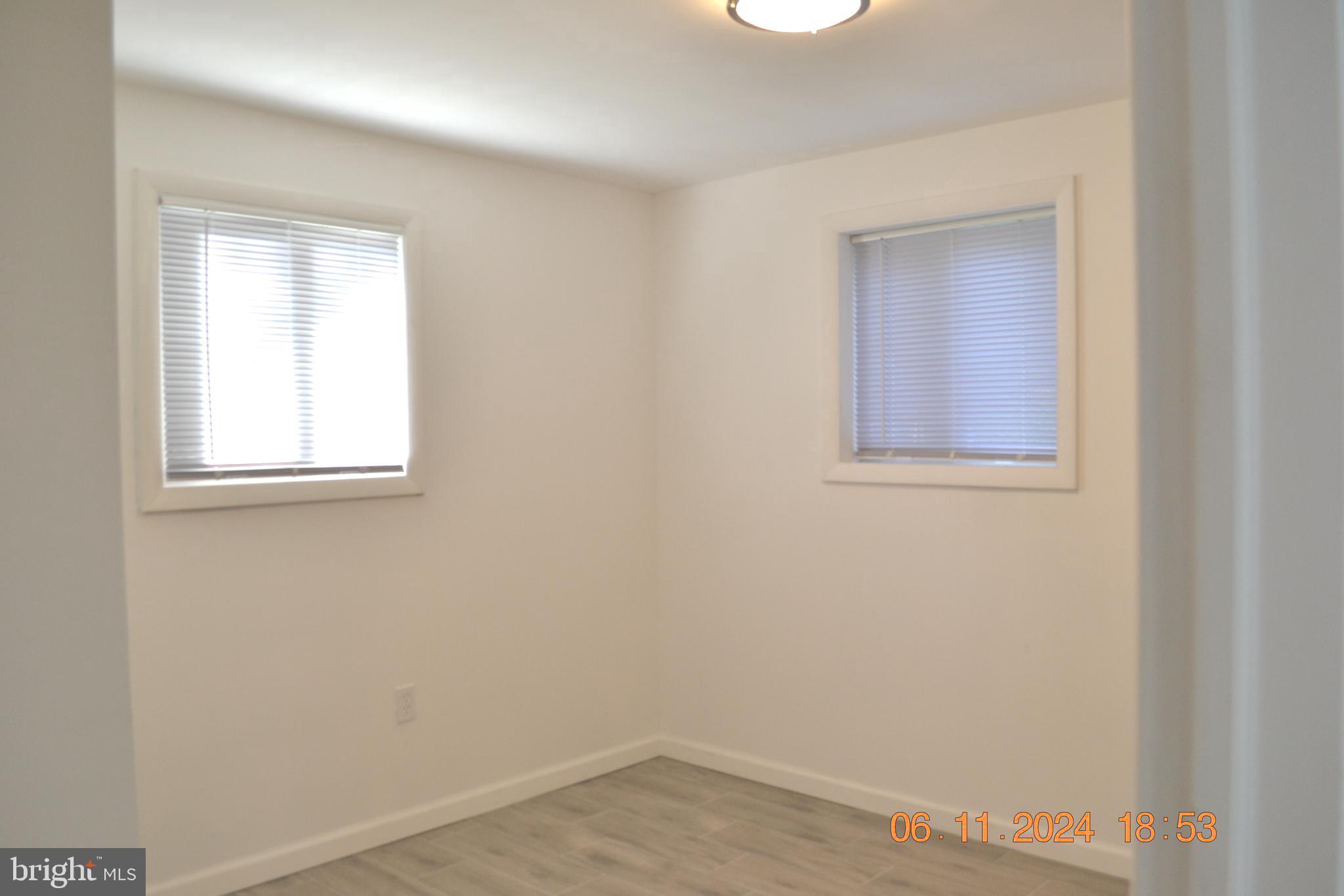 329 A Bar Harbor Road Pasadena, MD 21122 - Photo 18 of 18 an empty room with a window