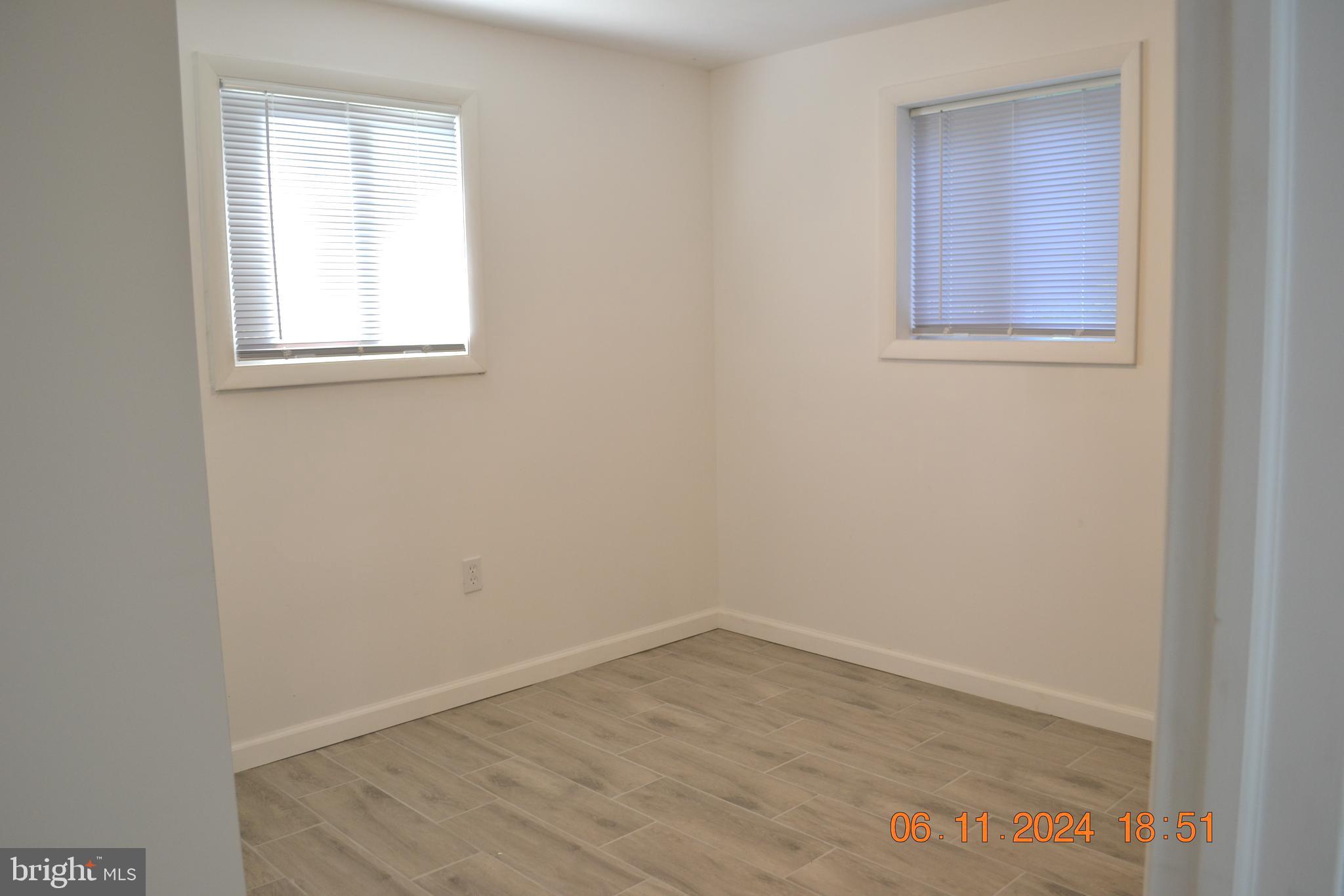 329 A Bar Harbor Road Pasadena, MD 21122 - Photo 8 of 18 an empty room with a window