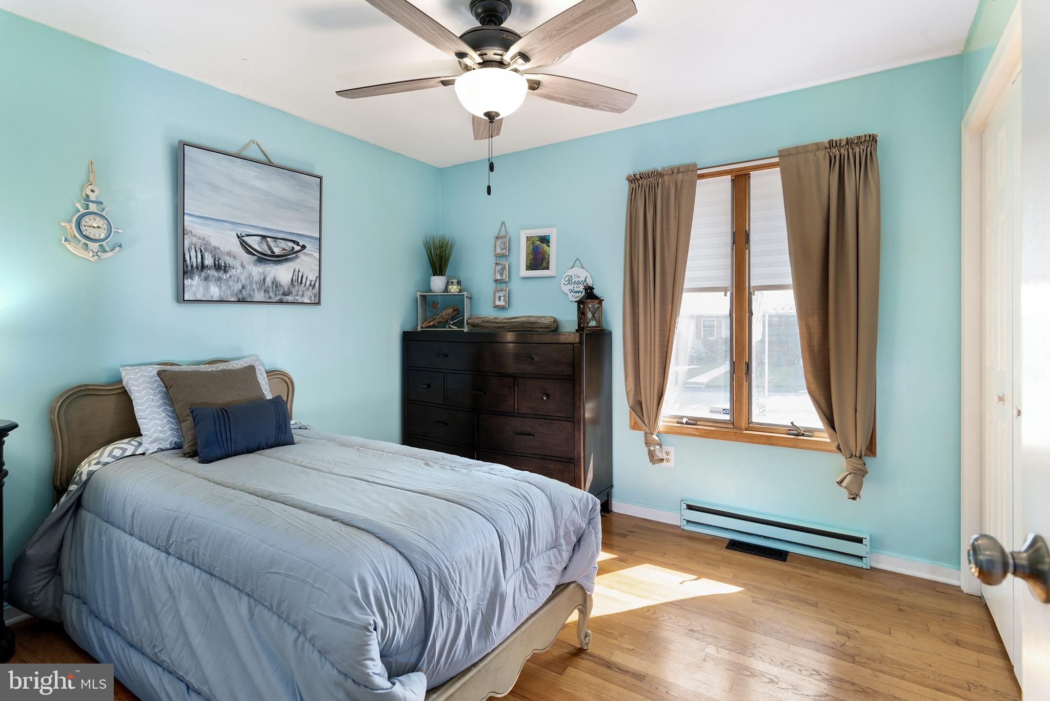 33 Low Road Earleville, MD 21919 - Photo 20 of 35 a bedroom with a bed and a window