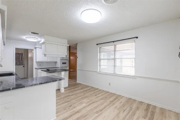 a view of empty room with a window