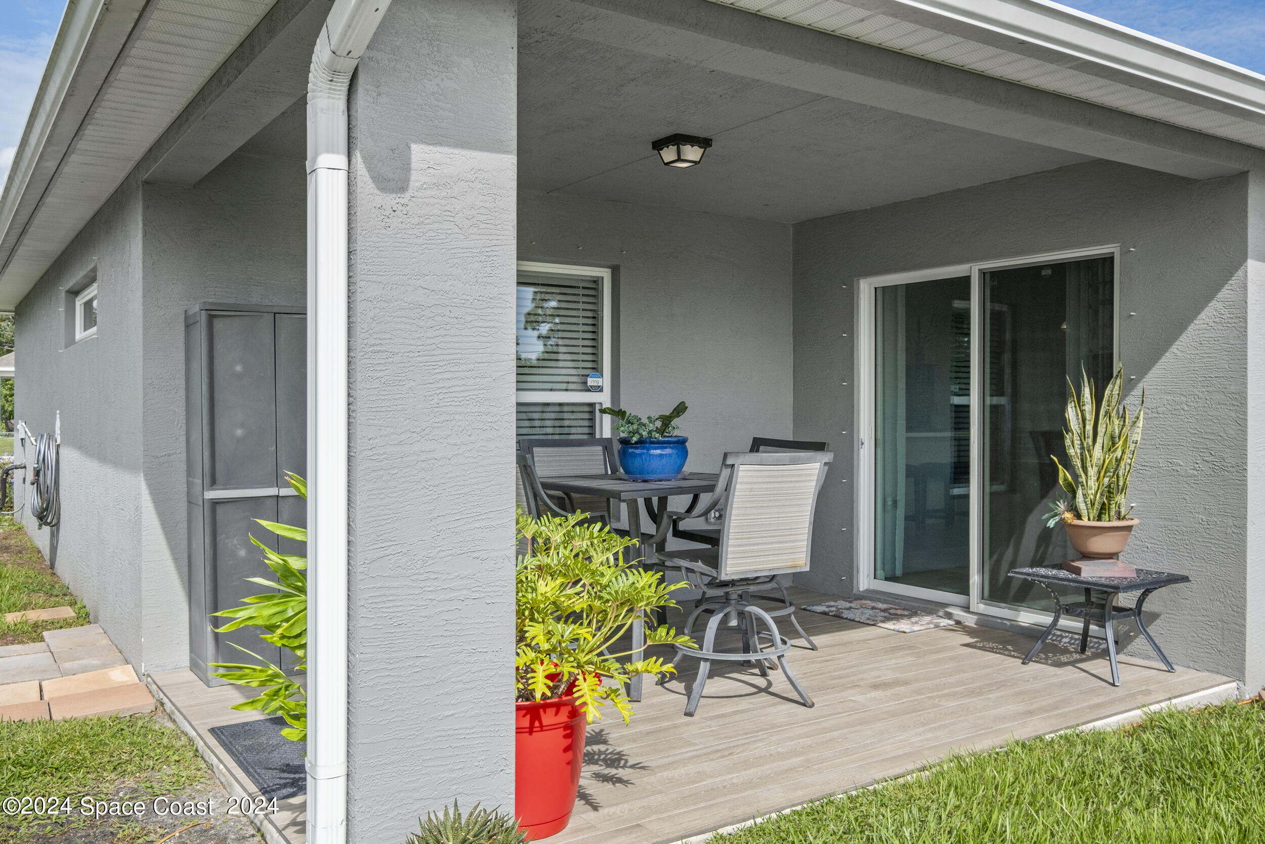 1011 Grapefruit Road Southeast Palm Bay, FL 32909 - Photo 32 of 42 a view of balcony and patio