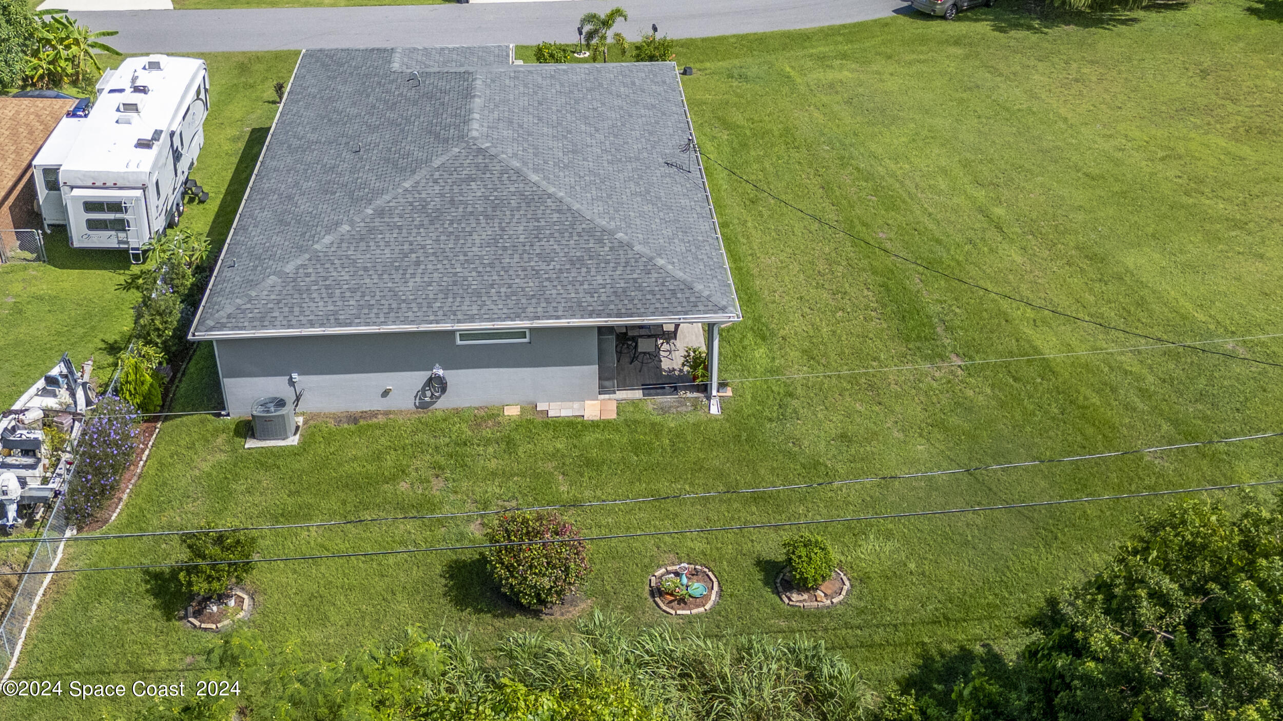 1011 Grapefruit Road Southeast Palm Bay, FL 32909 - Photo 37 of 42 an aerial view of a house