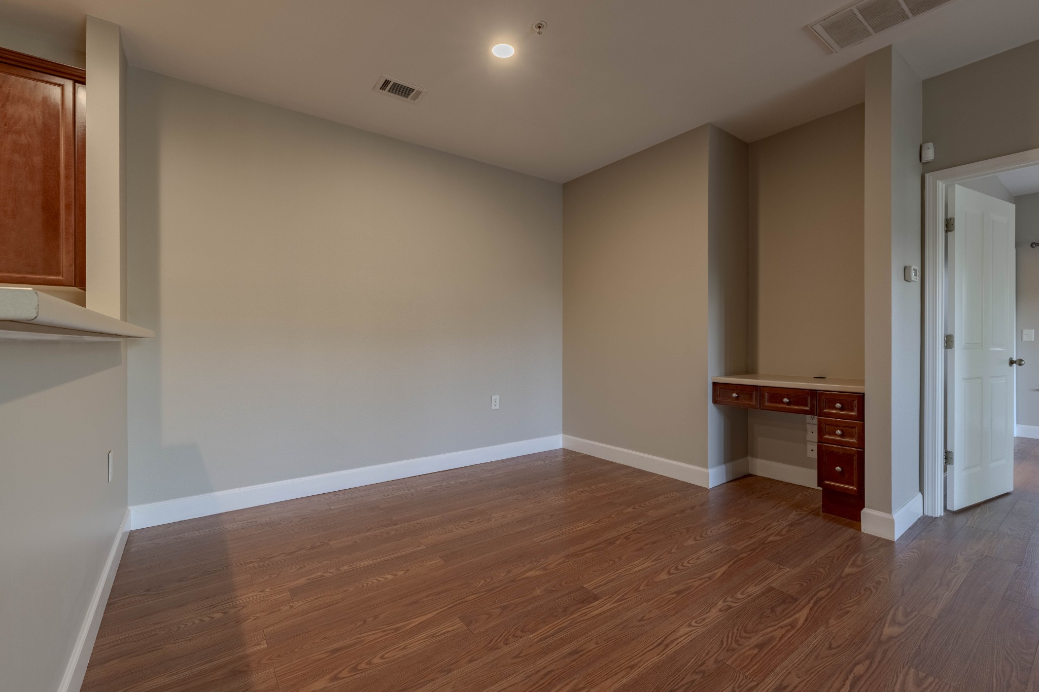 7321 Althorp Way, Unit R5 Nashville, TN 37211 - Photo 12 of 29 an empty room with wooden floor