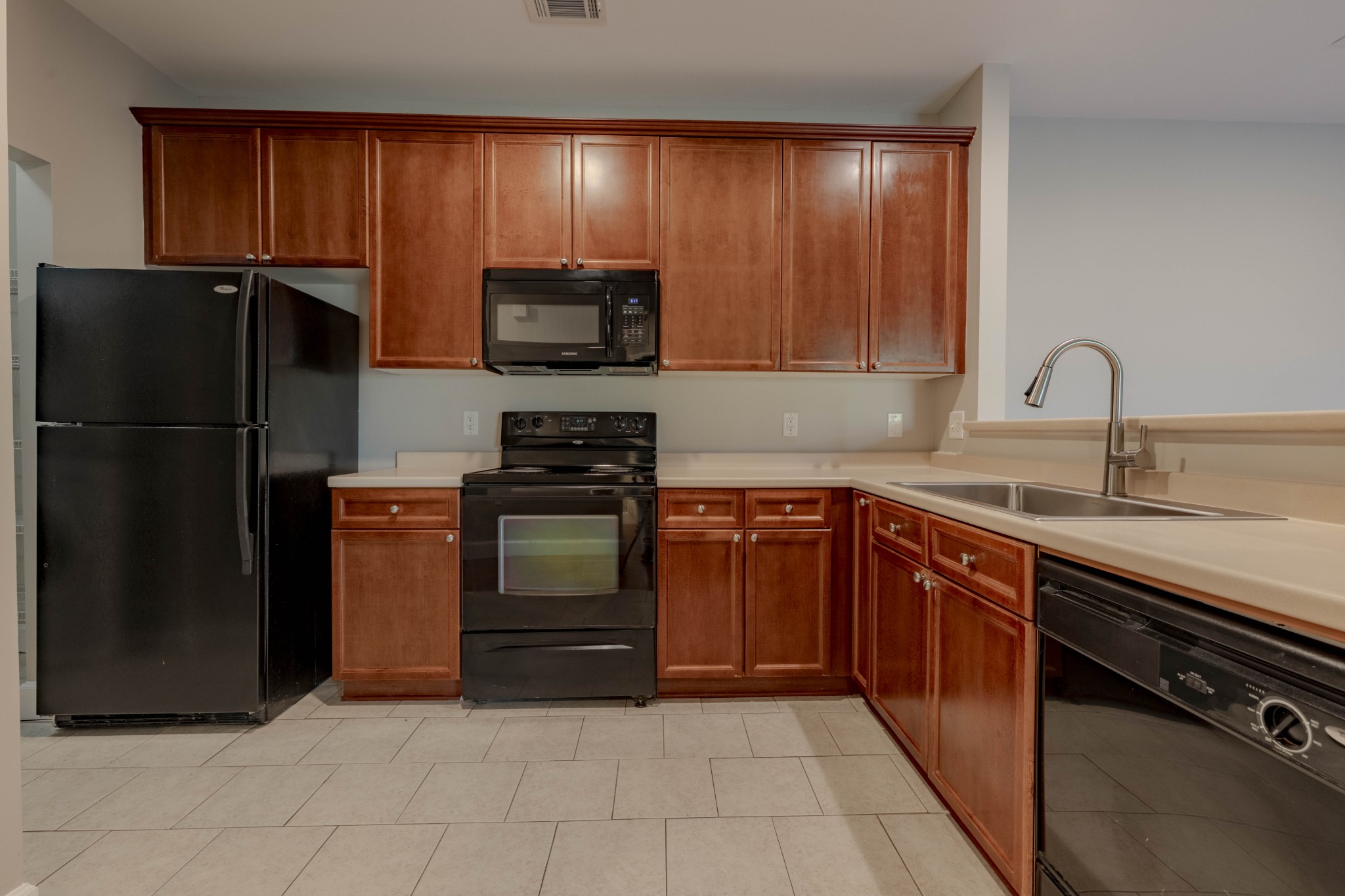 7321 Althorp Way, Unit R5 Nashville, TN 37211 - Photo 2 of 29 a kitchen with a refrigerator and a sink