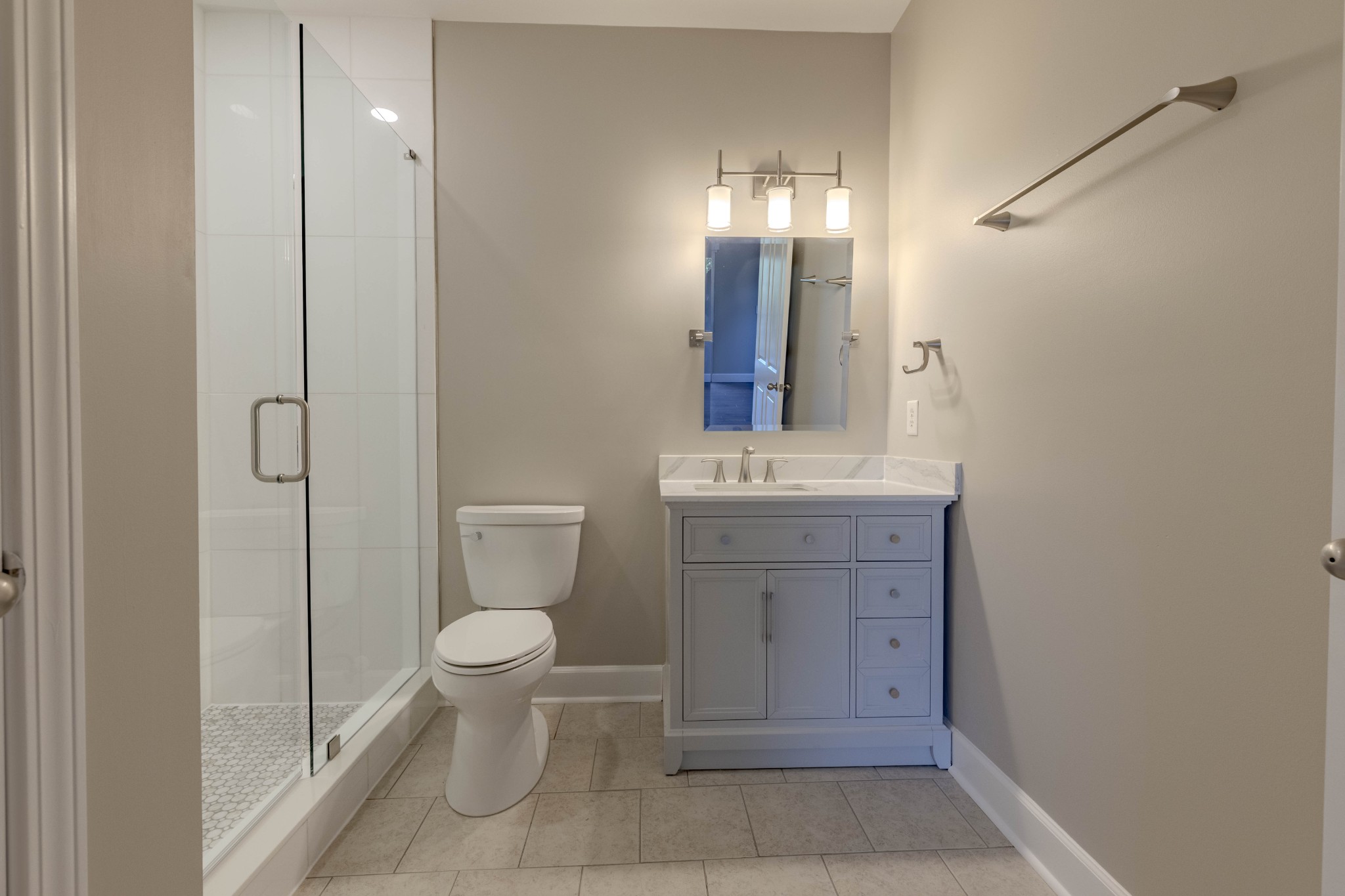7321 Althorp Way, Unit R5 Nashville, TN 37211 - Photo 21 of 29 a bathroom with a toilet sink and mirror