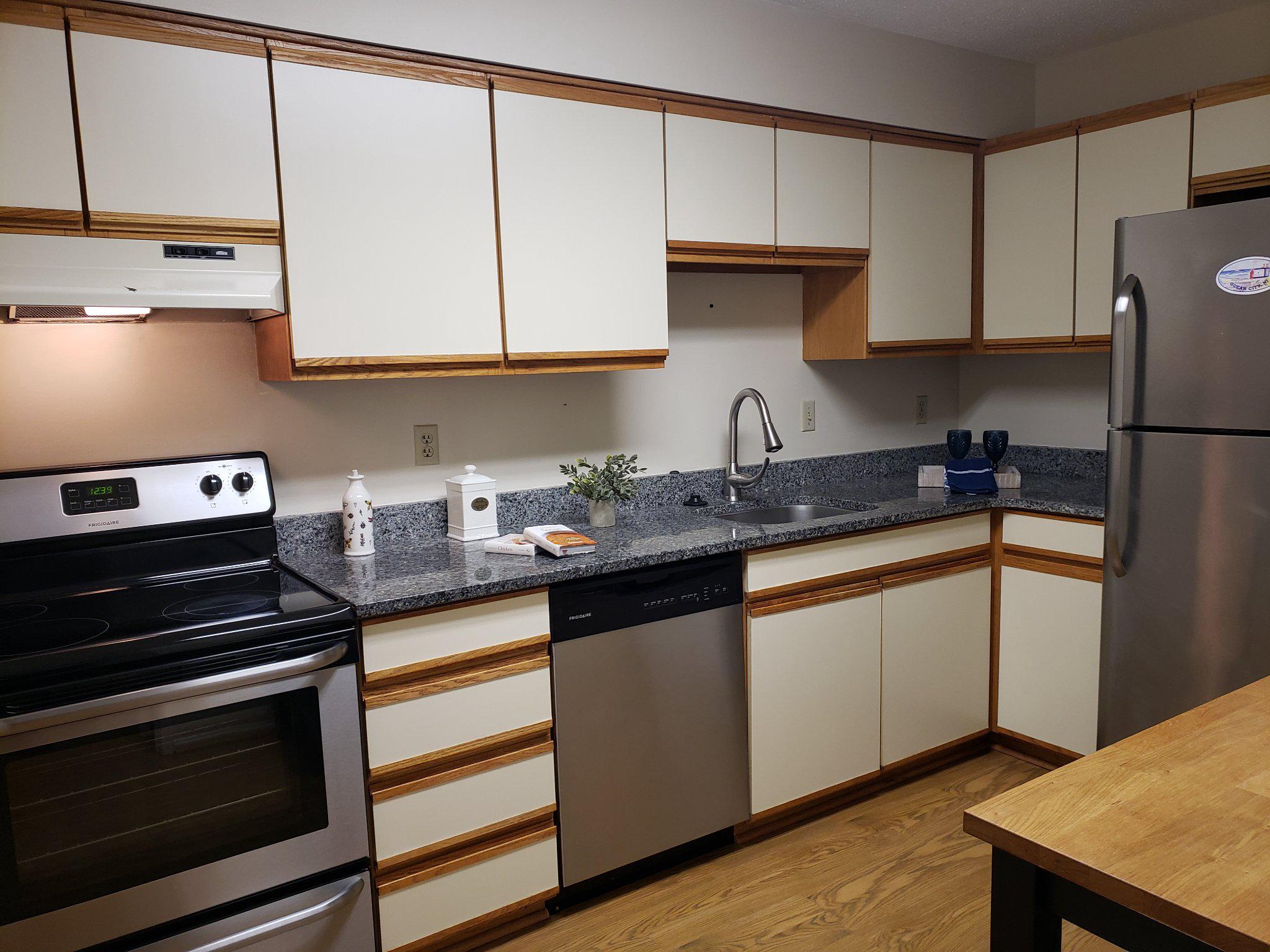 15100 Interlachen Drive, Unit 4520 Silver Spring, MD 20906 - Photo 13 of 39 Granite Kitchen Countertop & Stainless Appliances
