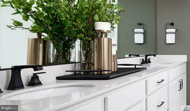 a view of a sink with mirror