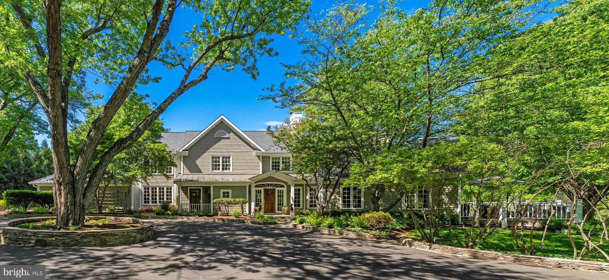Elegant home on 10 acres with barn & pool