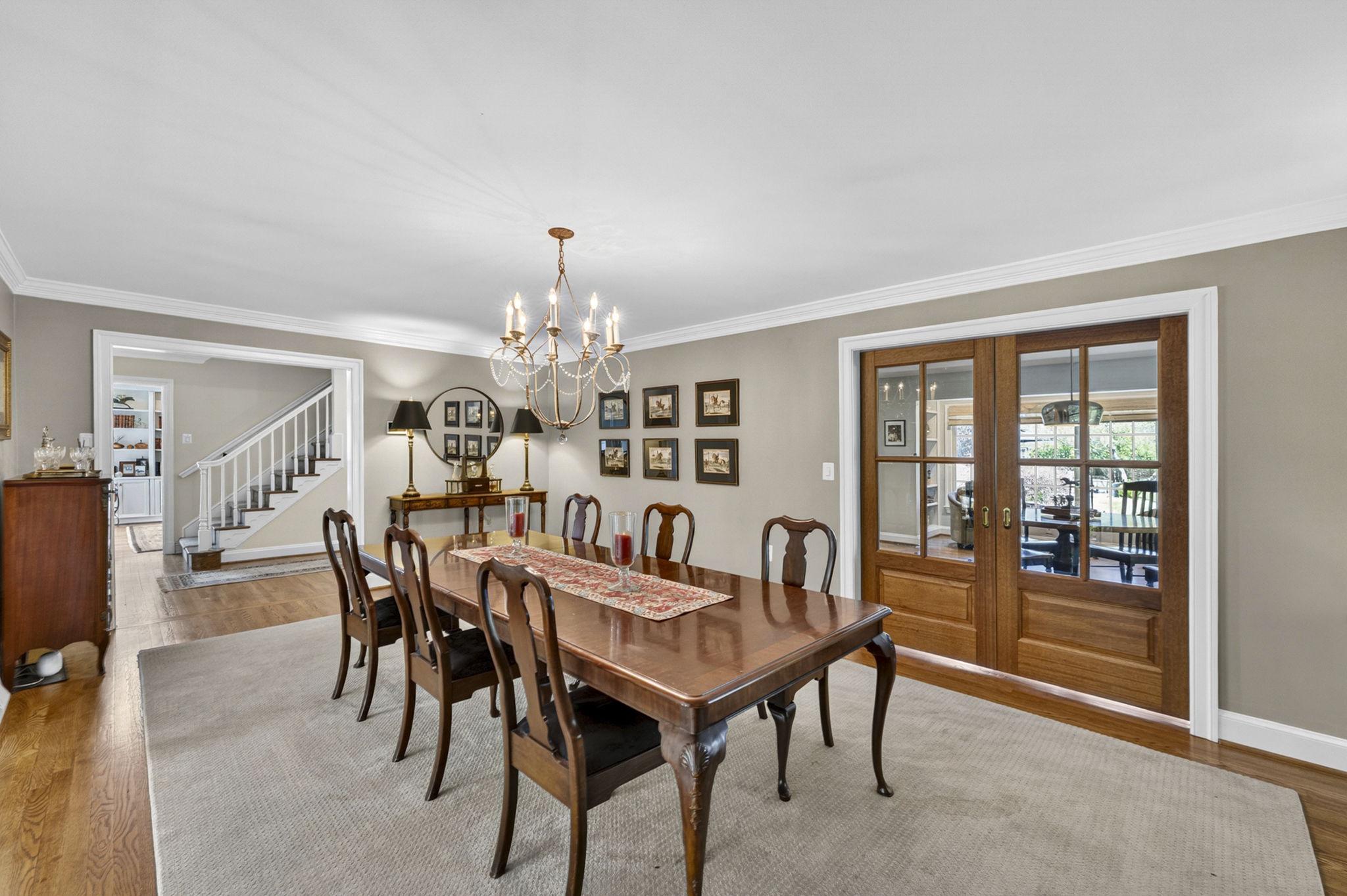 23559 Parsons Road Middleburg, VA 20117 - Photo 15 of 75 a view of a dining room with furniture and chandelier