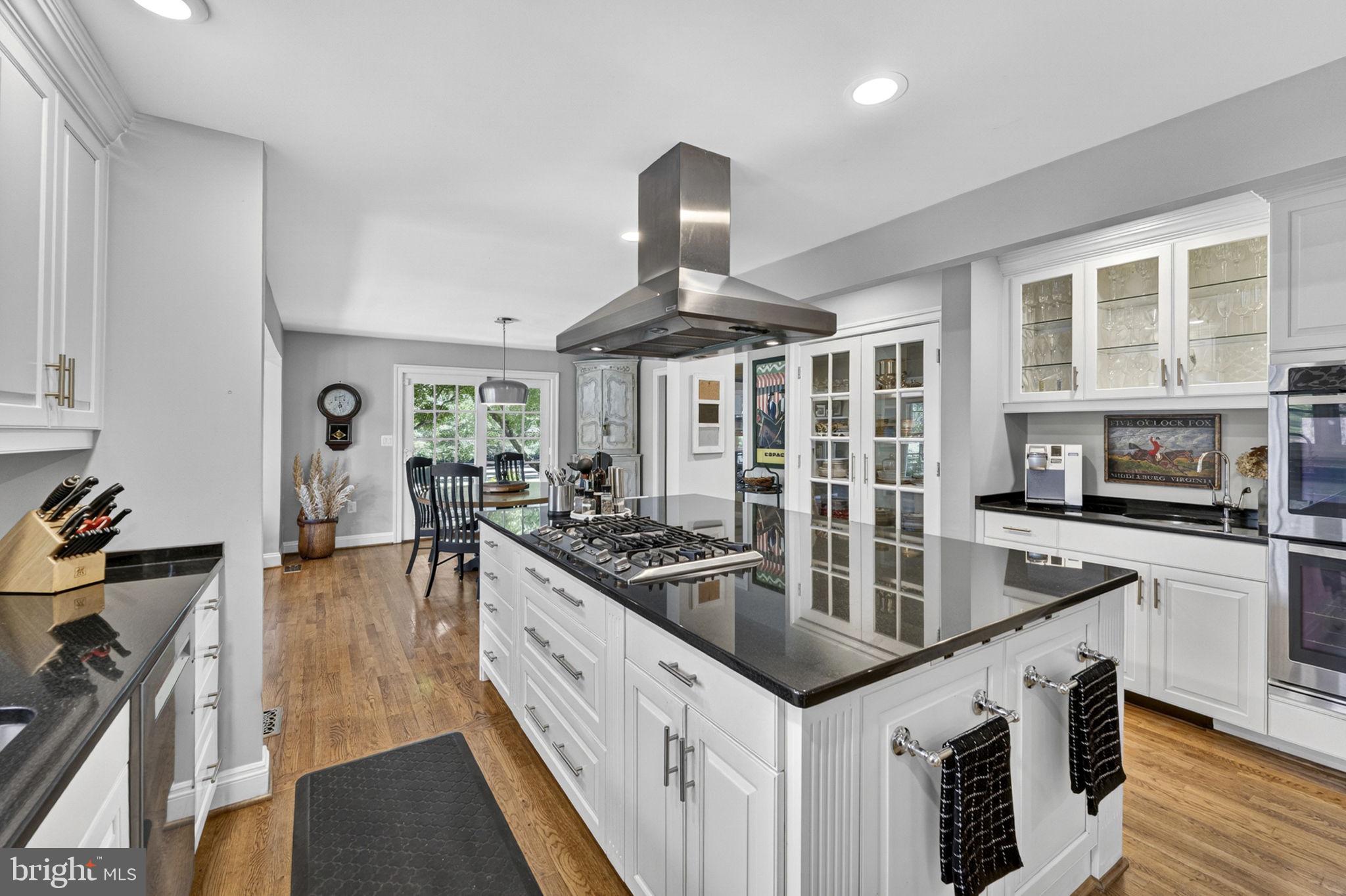 23559 Parsons Road Middleburg, VA 20117 - Photo 18 of 75 a kitchen with stainless steel appliances granite countertop a stove and a sink
