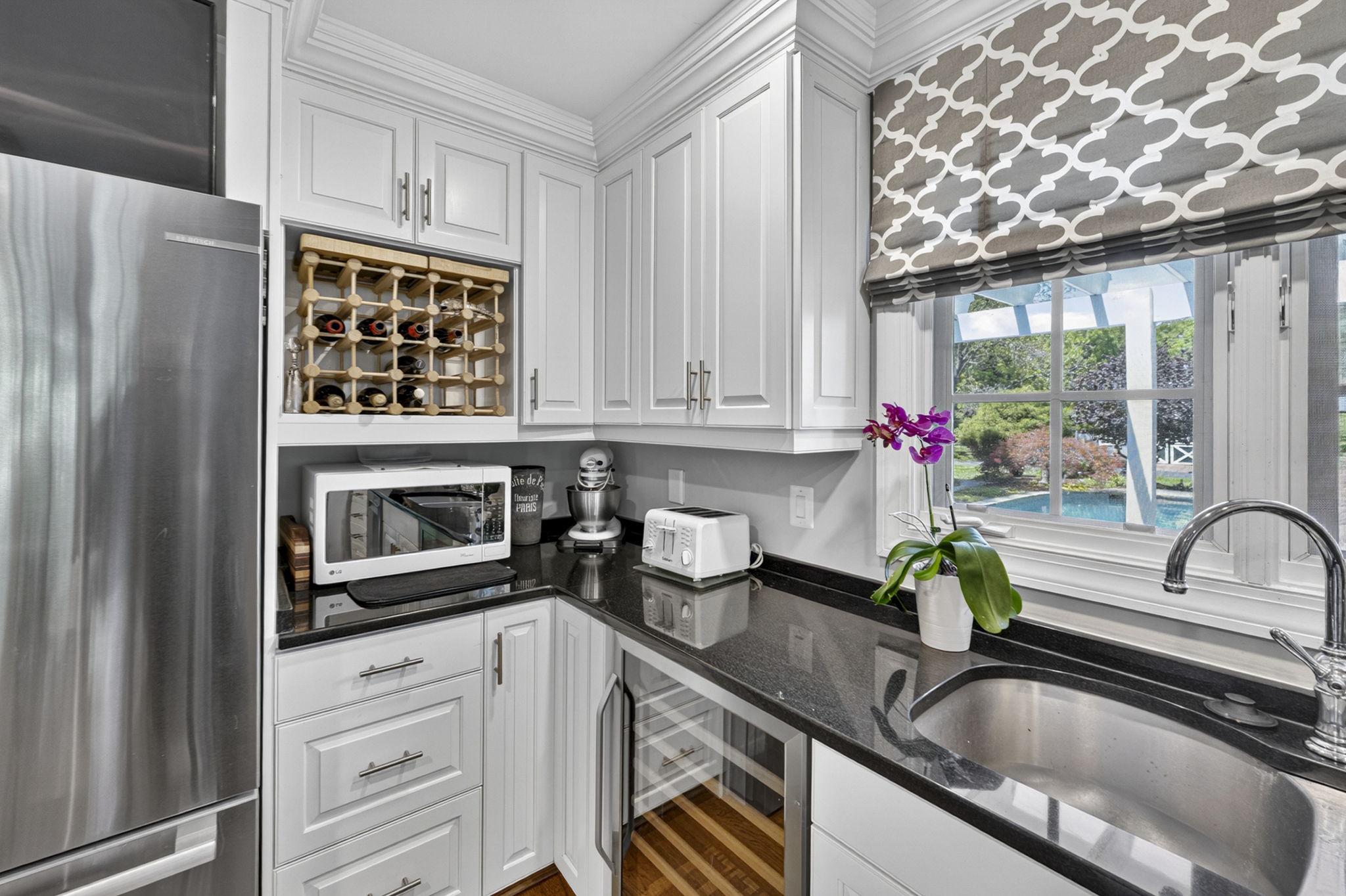 23559 Parsons Road Middleburg, VA 20117 - Photo 22 of 75 a kitchen with a sink cabinets and window