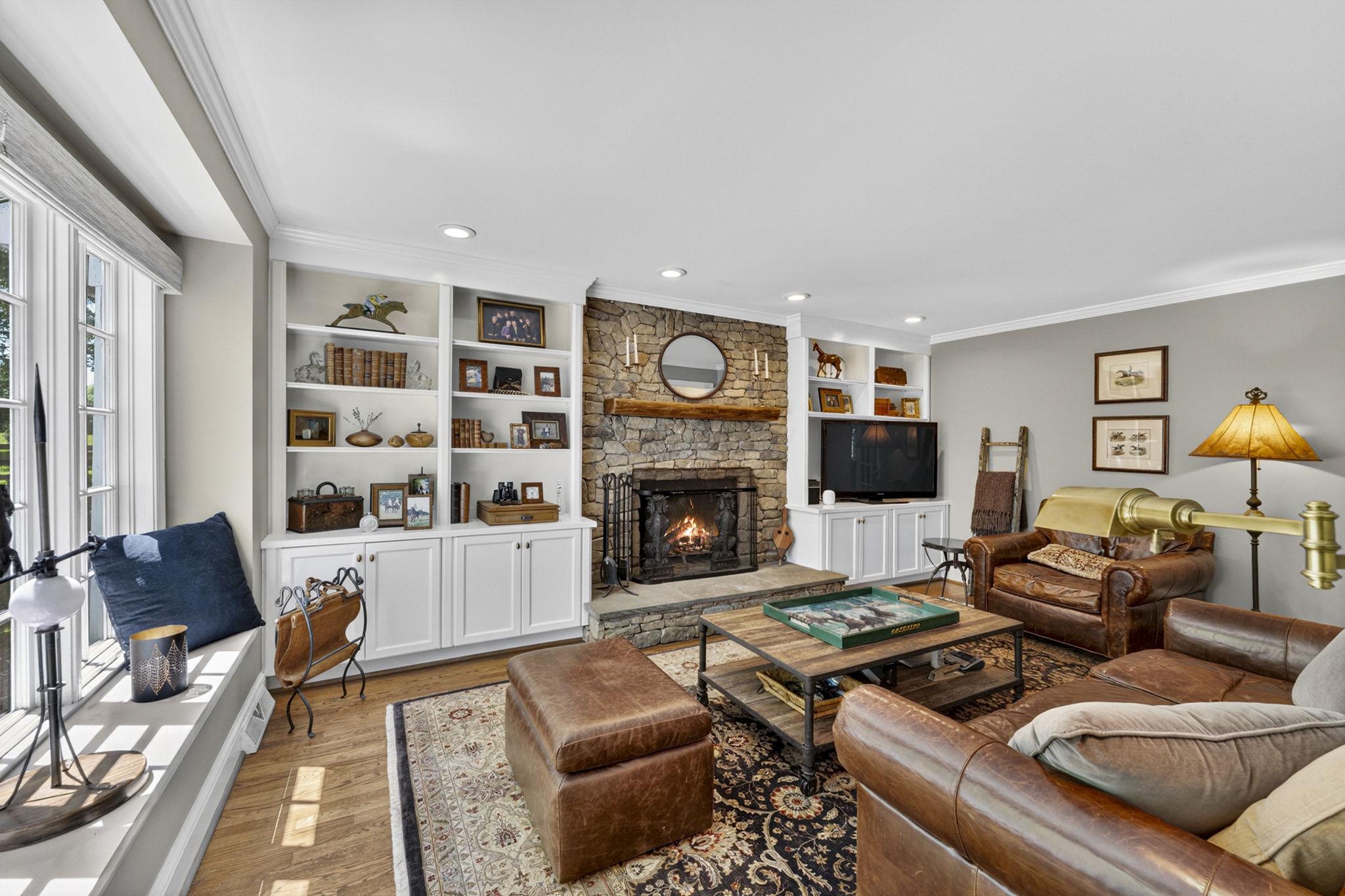 23559 Parsons Road Middleburg, VA 20117 - Photo 28 of 75 a living room with furniture and a fireplace