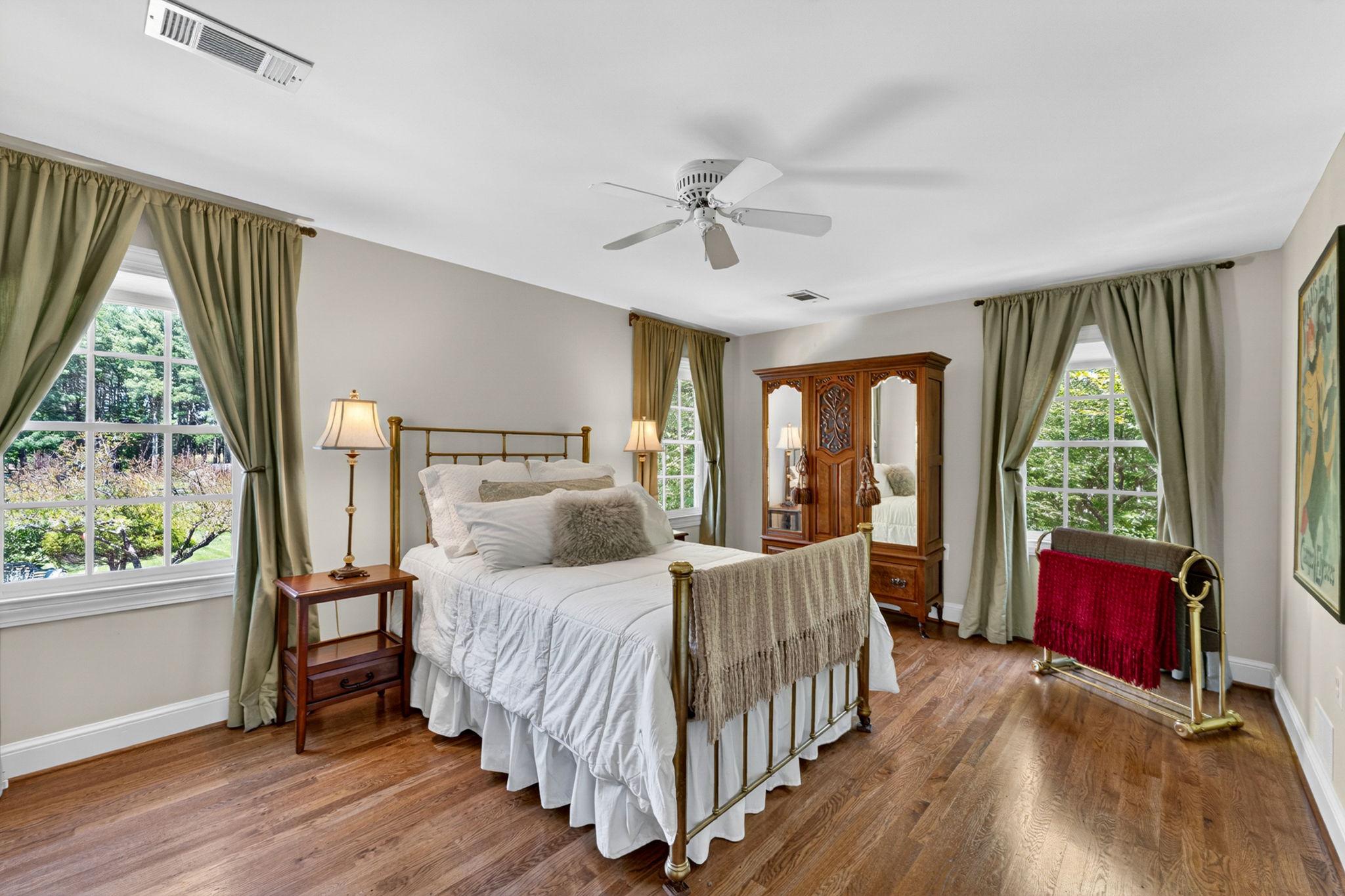 23559 Parsons Road Middleburg, VA 20117 - Photo 40 of 75 a bedroom with a large bed and a large window