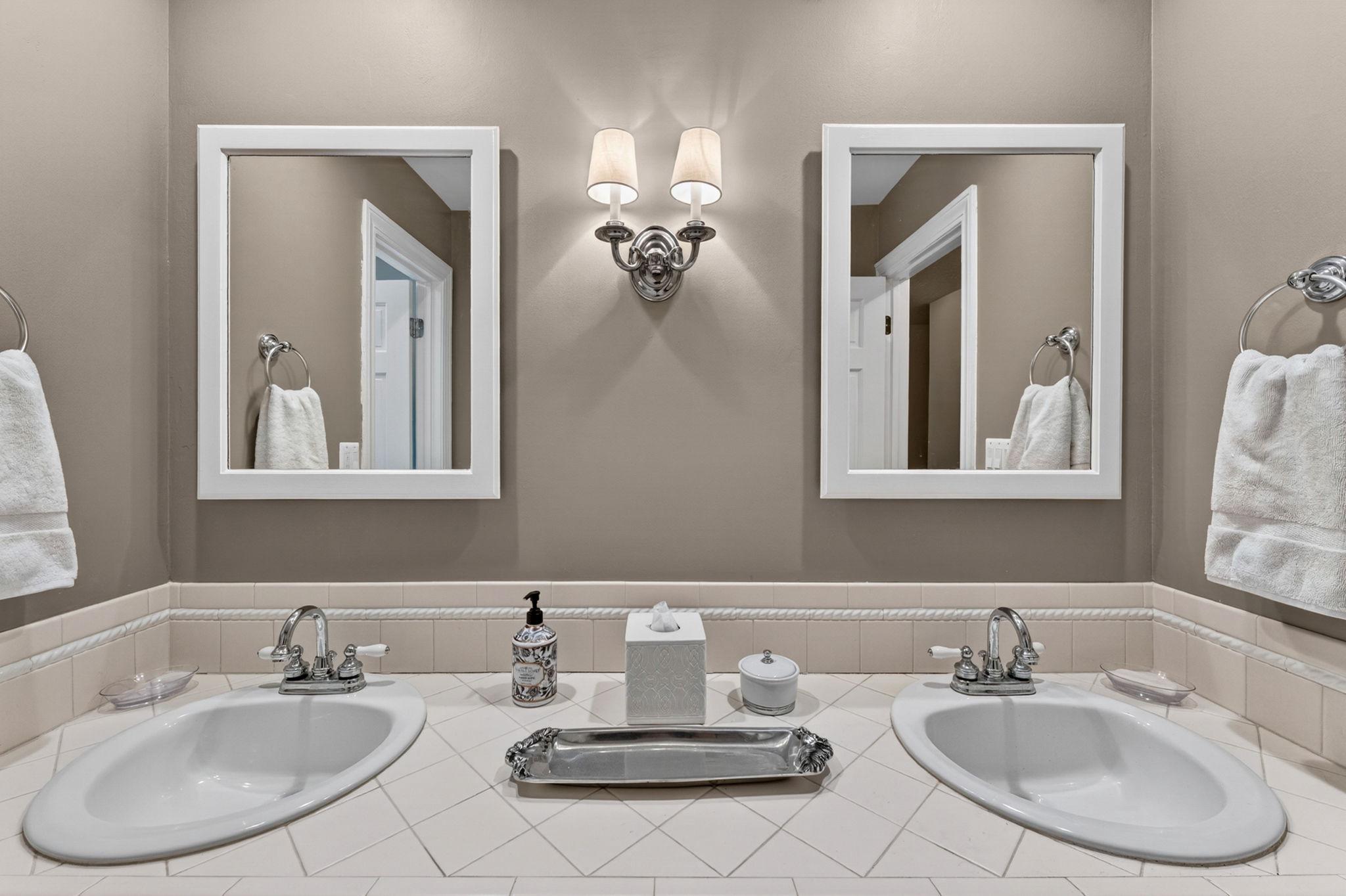23559 Parsons Road Middleburg, VA 20117 - Photo 42 of 75 a bathroom with a double vanity sink and a mirror