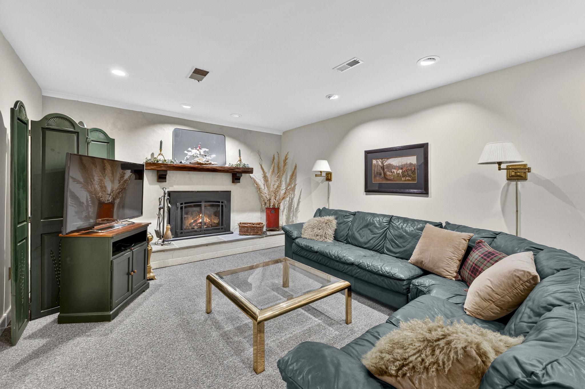 23559 Parsons Road Middleburg, VA 20117 - Photo 43 of 75 a living room with furniture and a fireplace