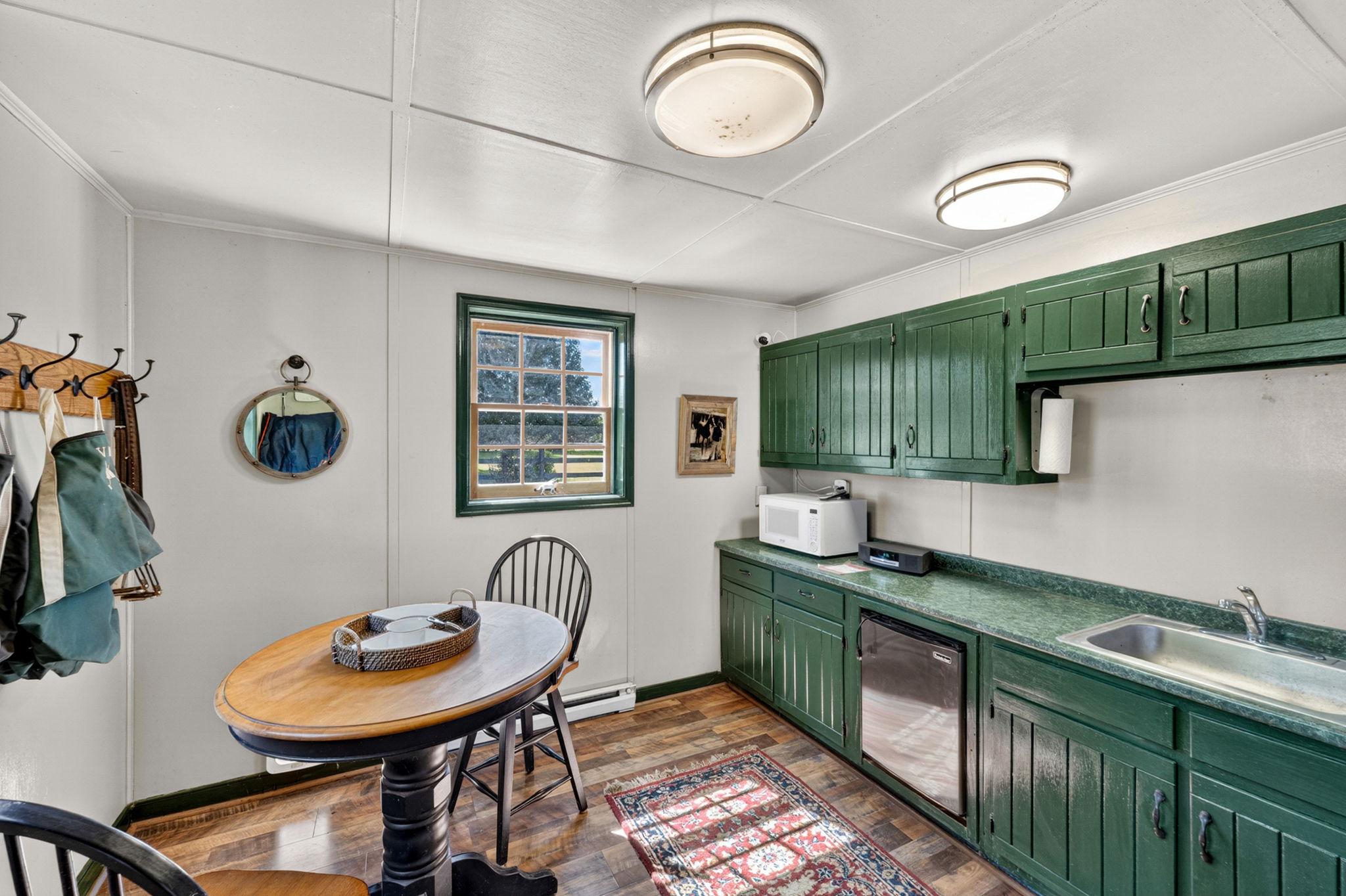 23559 Parsons Road Middleburg, VA 20117 - Photo 65 of 75 a kitchen with a sink cabinets and window