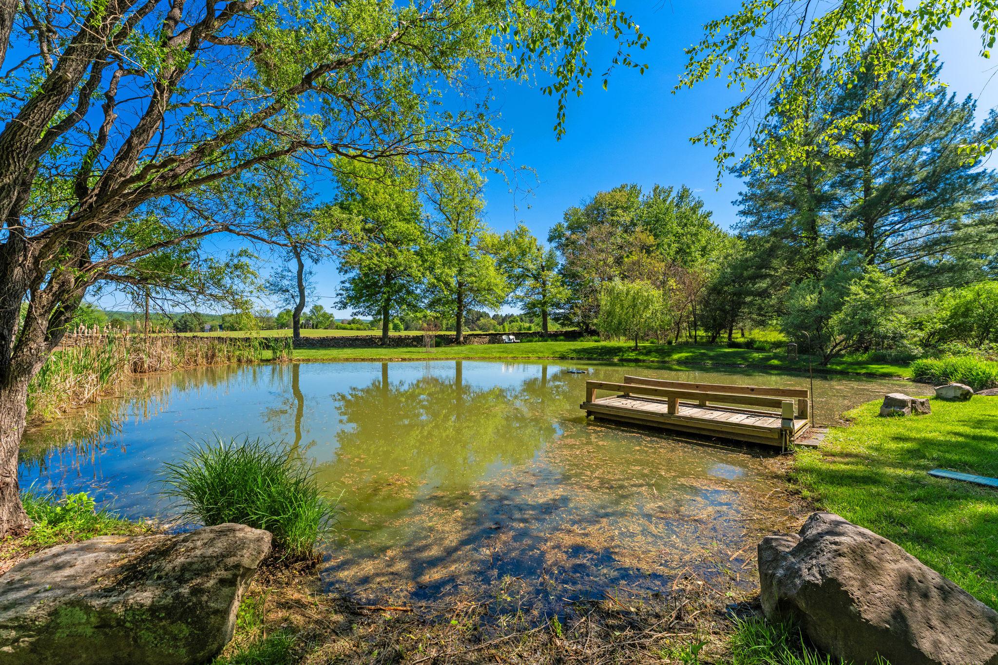 23559 Parsons Road Middleburg, VA 20117 - Photo 74 of 75 a view of a lake with houses in the back