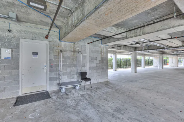 a view of a room with wooden walls