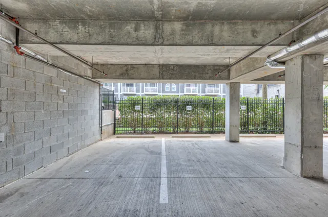 a view of an empty room with windows and yard