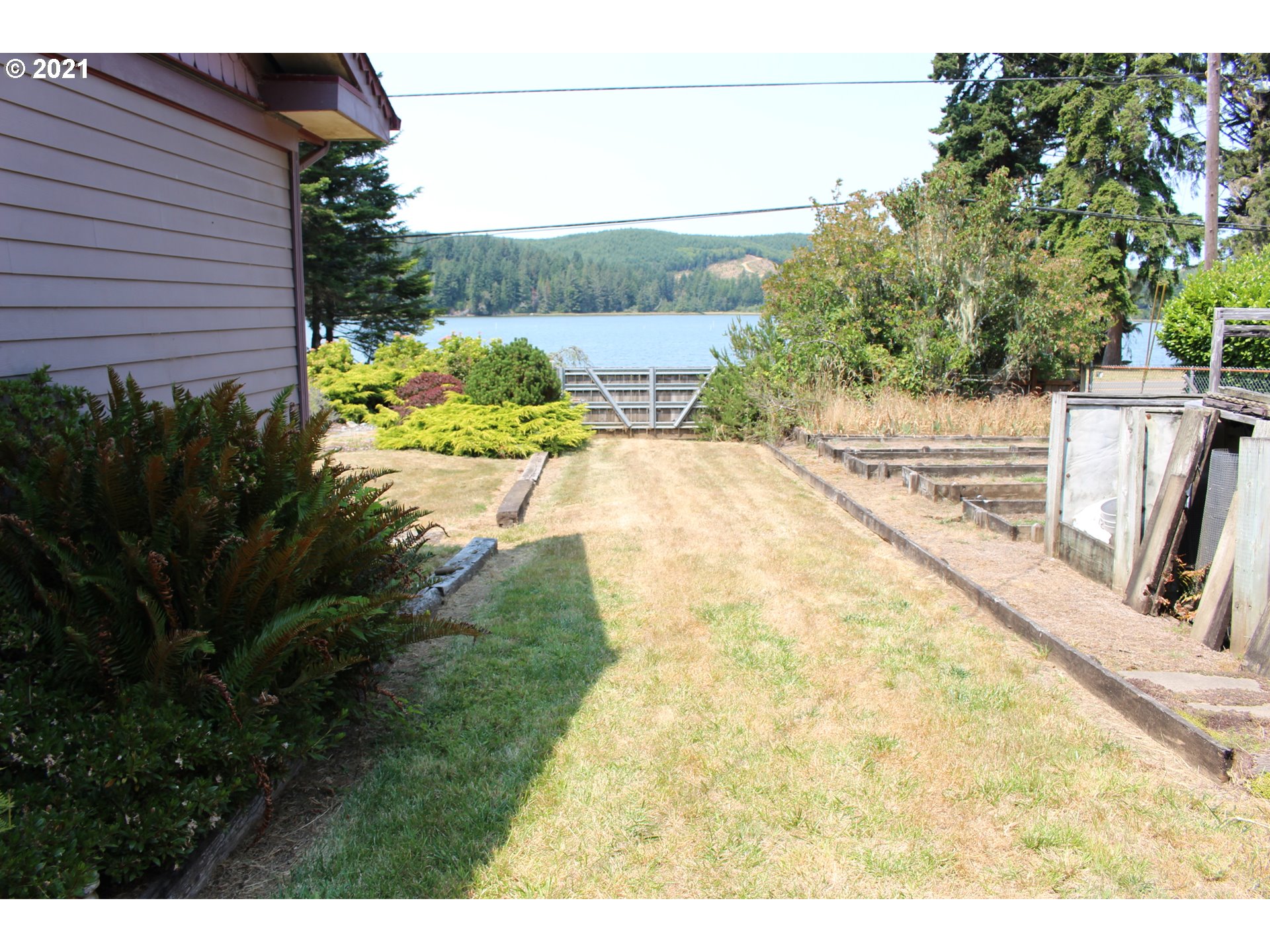 66069 North Bay Road North Bend, OR 97459 - Photo 6 of 32 a view of outdoor space and yard