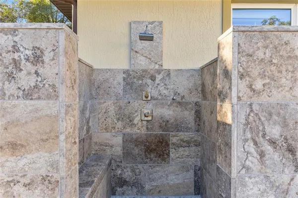 a kitchen with a stove a sink and a refrigerator