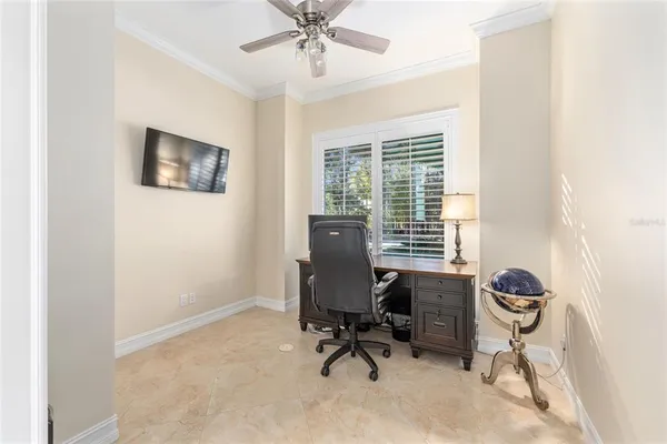 a large kitchen with kitchen island a sink a stove and a refrigerator