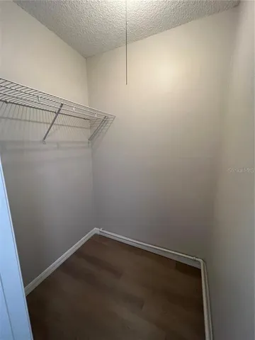 a view of a room with racks on the wall